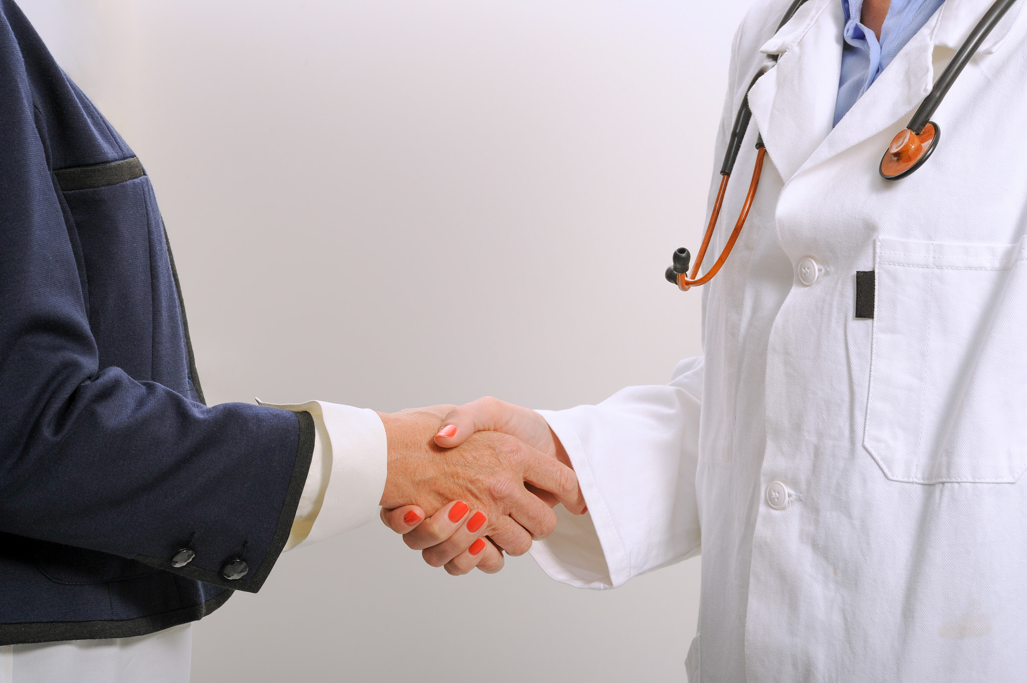Nikon D3S + Nikon AF-S Nikkor 85mm F1.4G sample photo. Handshake between a doctor and his patient photography