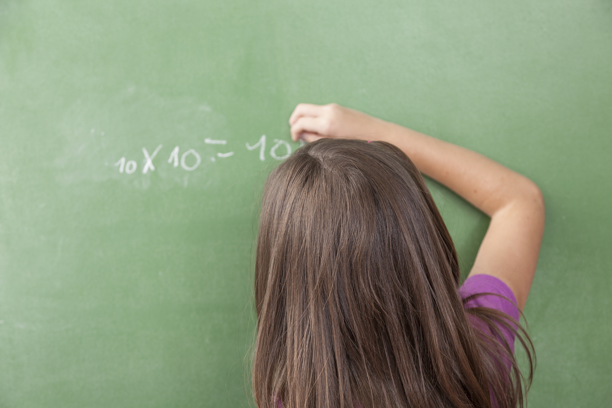 Girl doing an excercise of math