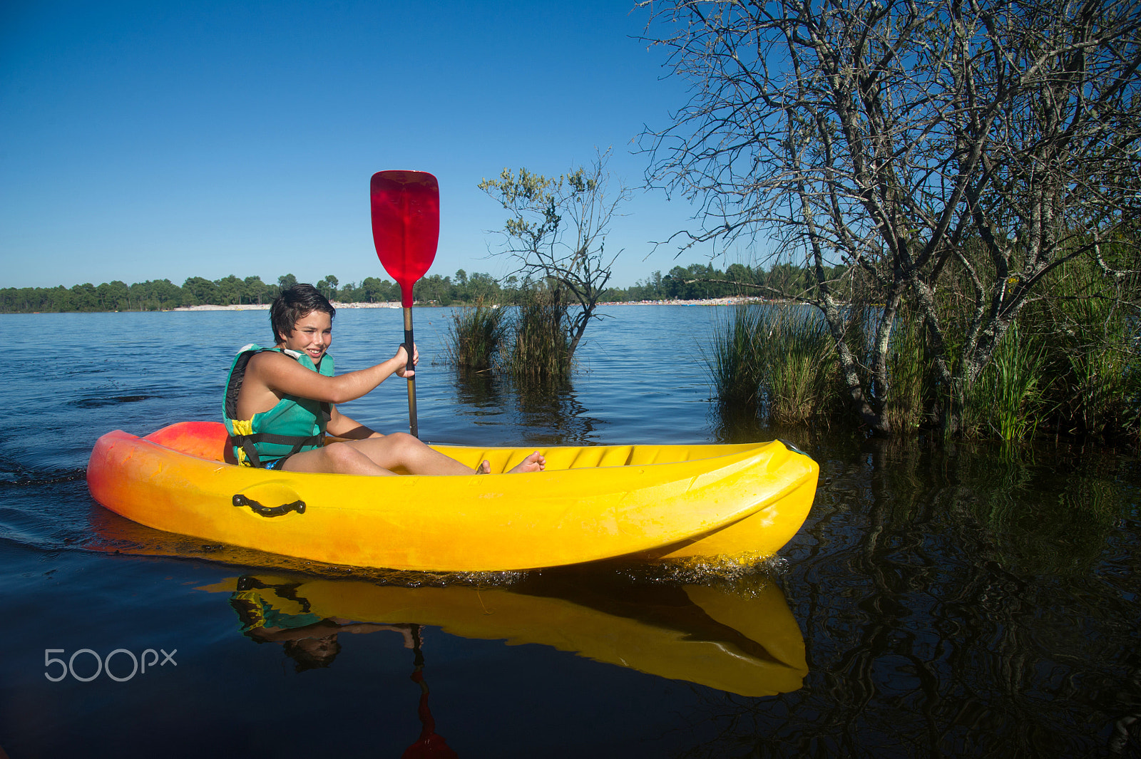 Nikon D3S sample photo. Teen making canoe kayak on a lake photography