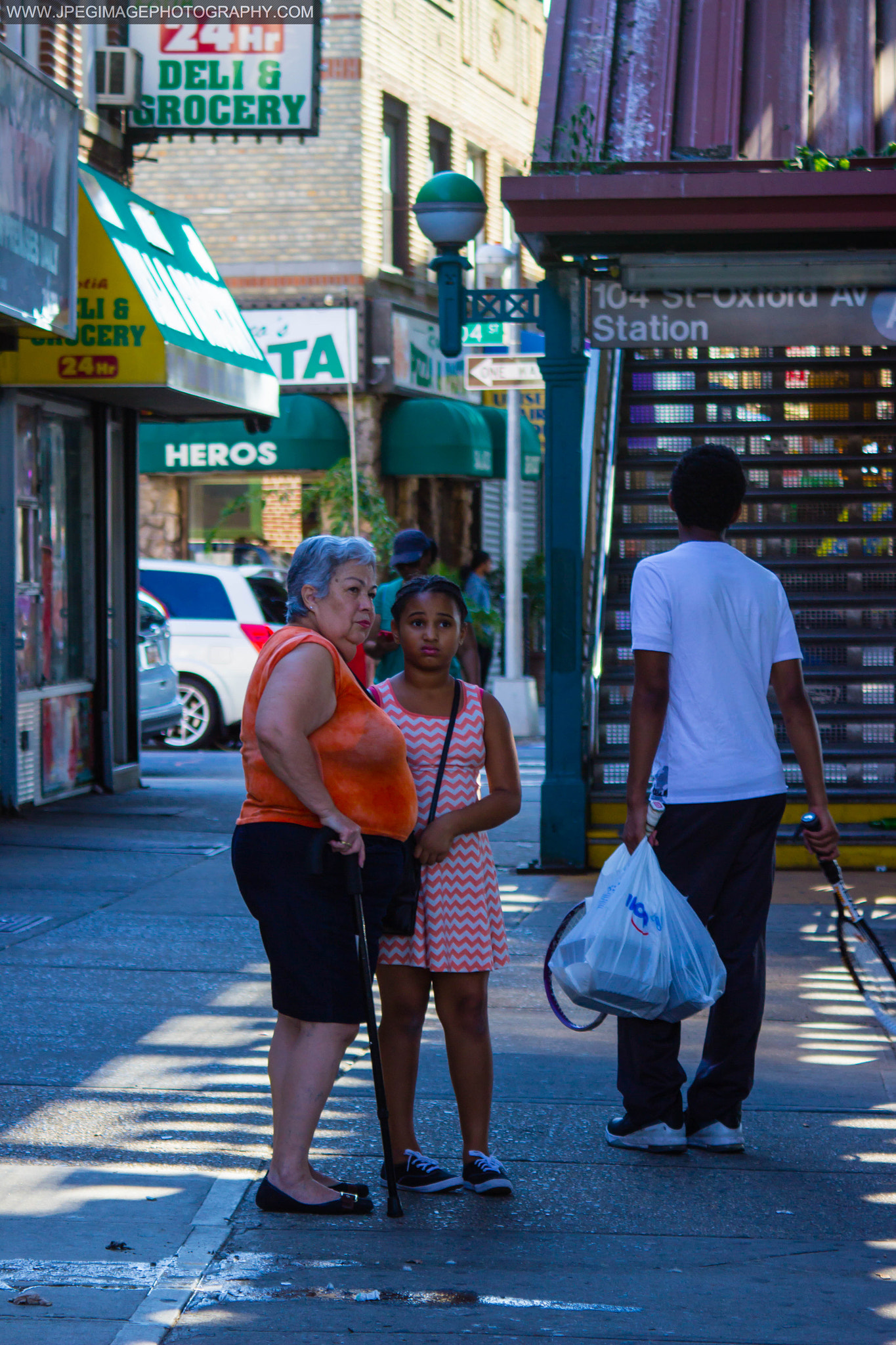 Canon EOS 600D (Rebel EOS T3i / EOS Kiss X5) + Canon EF 28-90mm f/4-5.6 sample photo. Three people wondering where to walk/travel to next, in ozone park, queens new york. august 7, 2016 photography