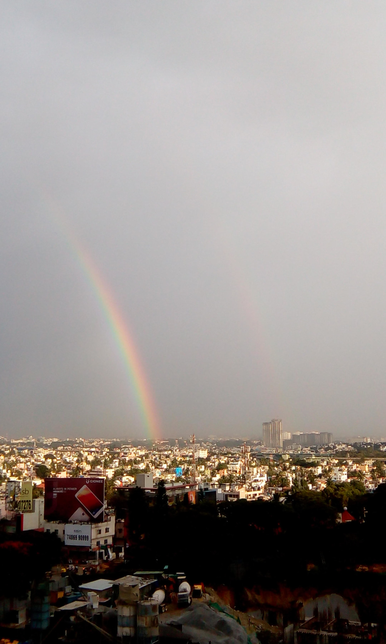 HTC DESIRE 620G DUAL SIM sample photo. Rainbow and the city photography