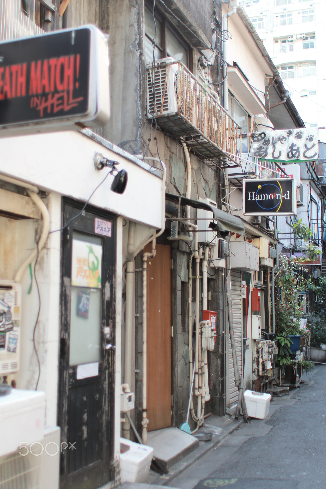 Canon EF 28mm F1.8 USM sample photo. Golden street nearby shinjuku station photography