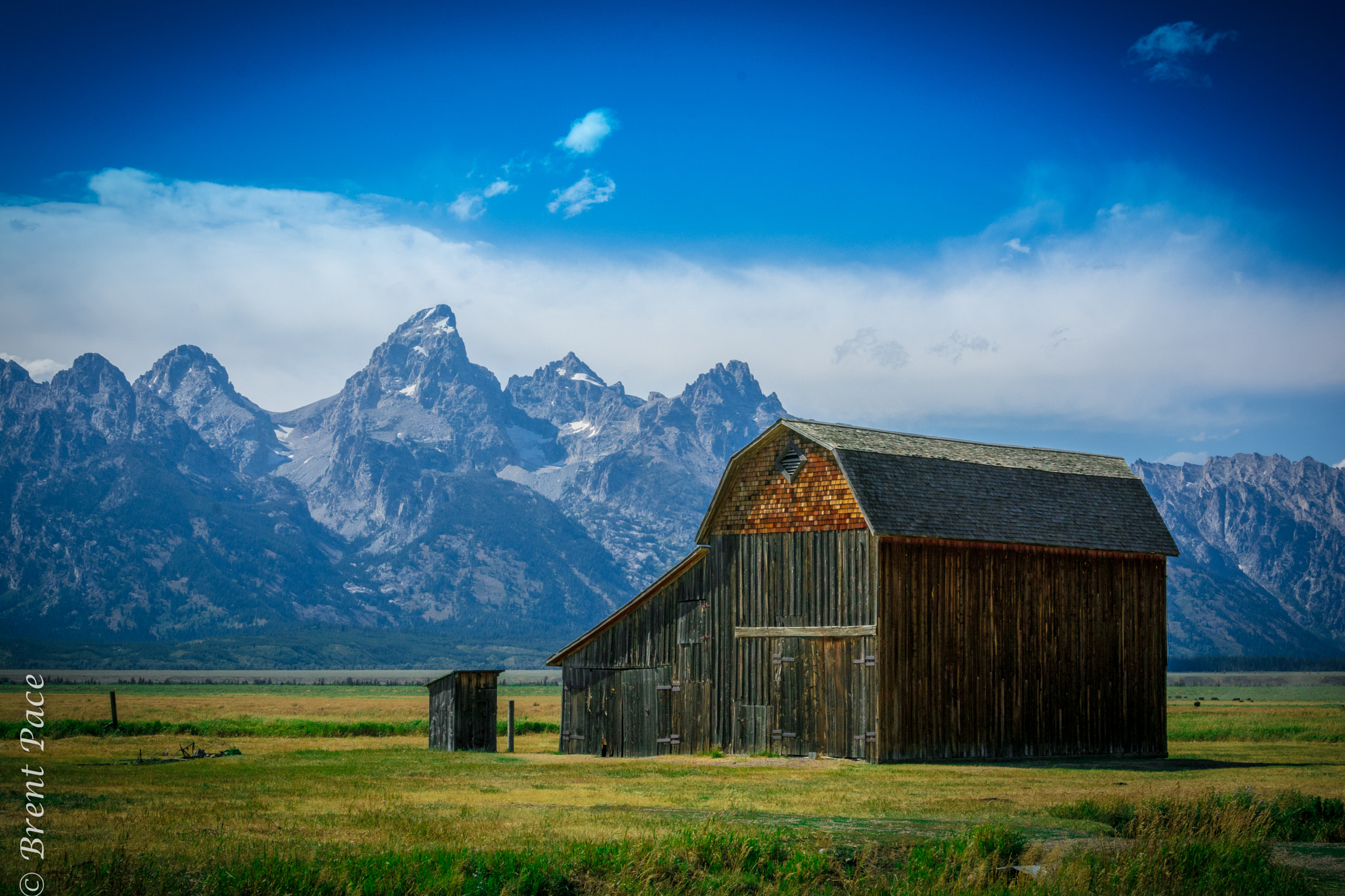 Nikon D7100 + Nikon AF-S Nikkor 24-85mm F3.5-4.5G ED VR sample photo. Grand teton and barn on mormon row photography