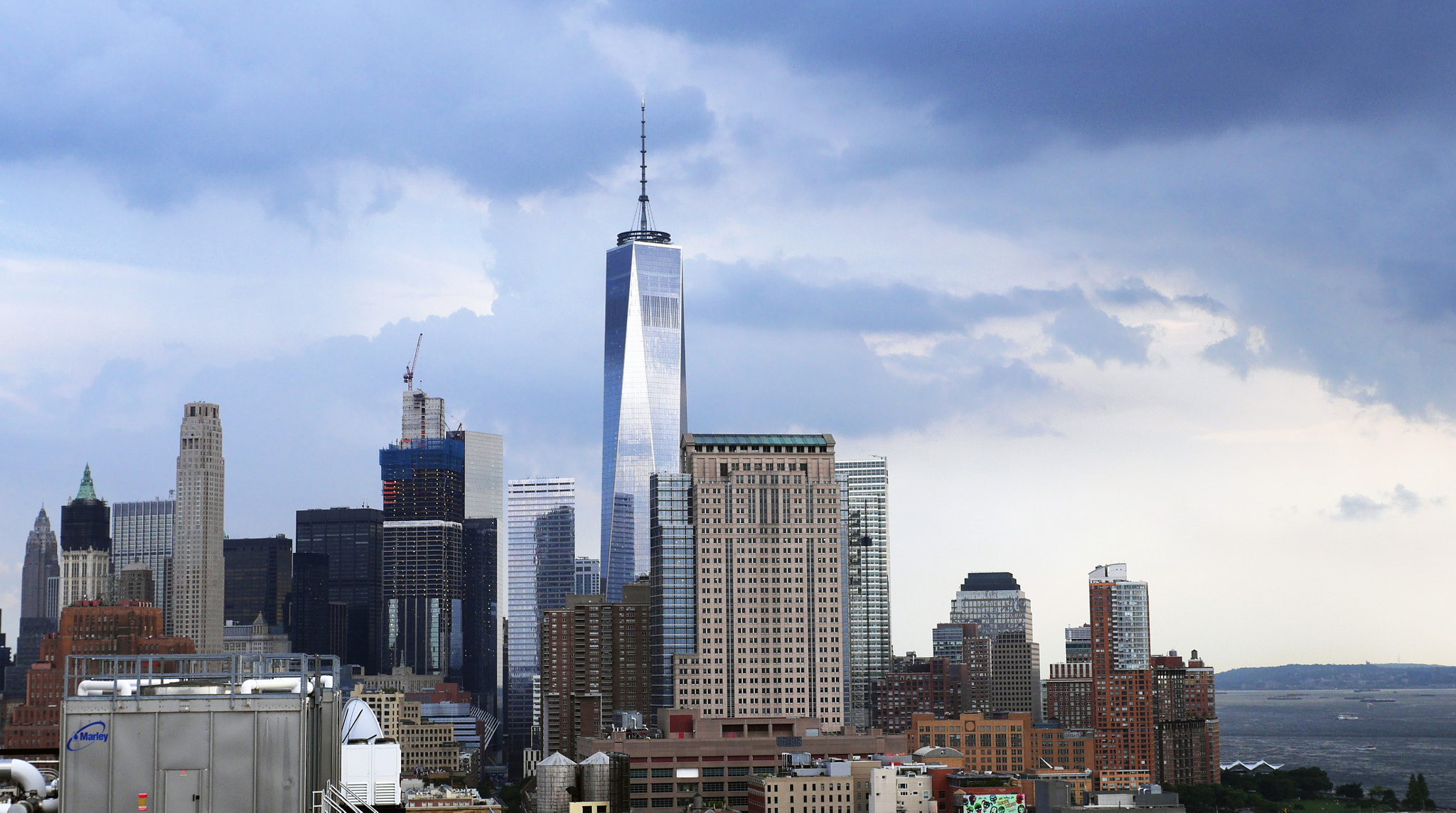 Panasonic Lumix DMC-GH3 + Panasonic Leica DG Summilux 25mm F1.4 II ASPH sample photo. Freedom tower photography