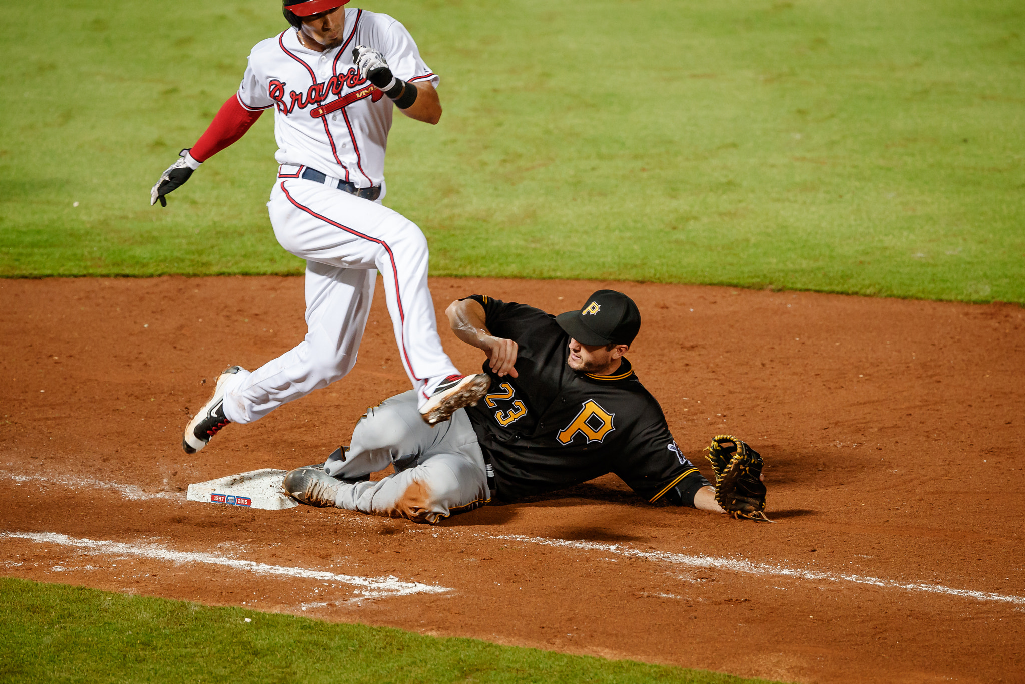 Canon EF 300mm F2.8L IS II USM sample photo. David freese slides in to get the out at first base. turner field atlanta photography