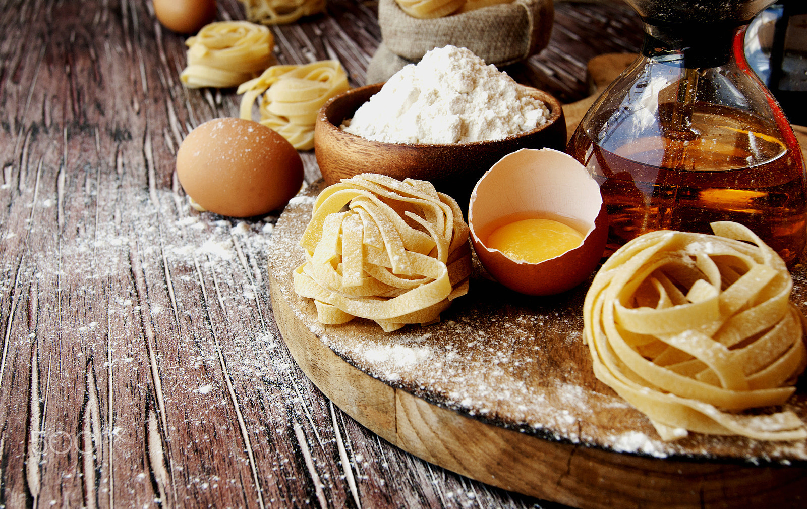 Sony Alpha DSLR-A380 + Sony DT 18-55mm F3.5-5.6 SAM sample photo. Uncooked pasta with flour on the table, selective focus photography