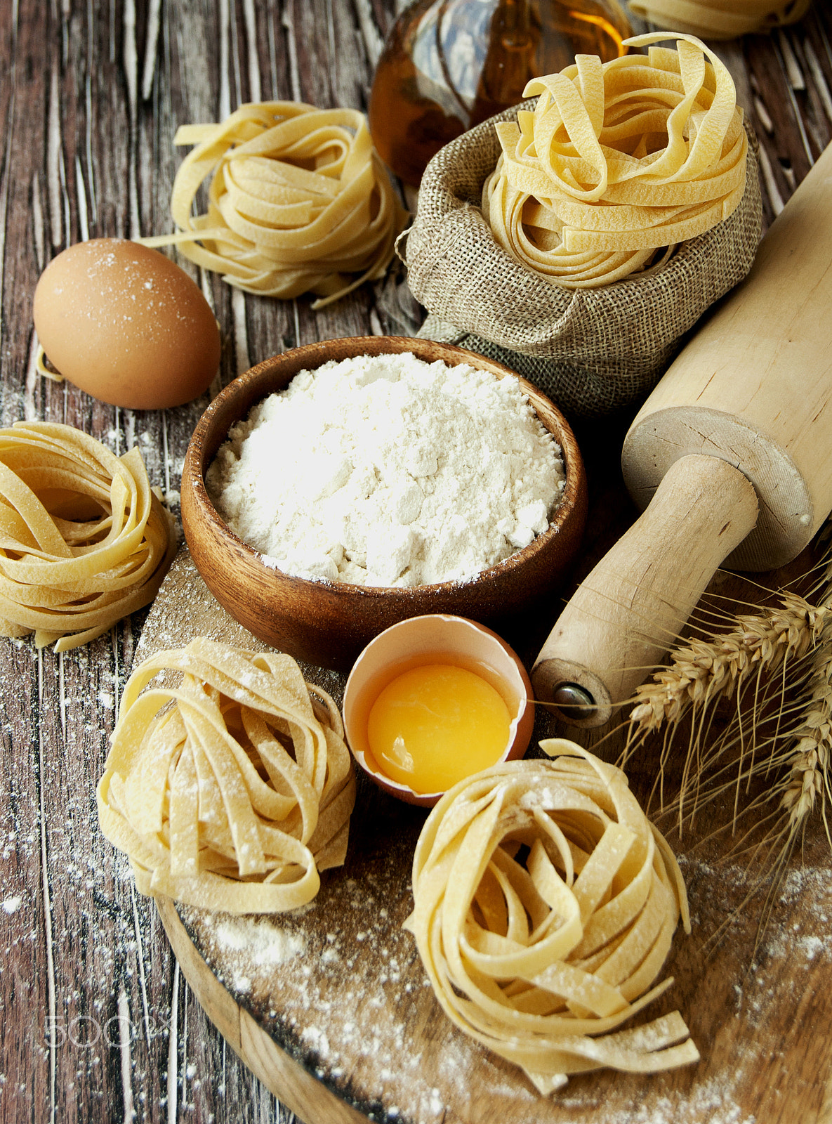 Sony Alpha DSLR-A380 + Sony DT 18-55mm F3.5-5.6 SAM sample photo. Uncooked pasta with flour on the table, selective focus photography