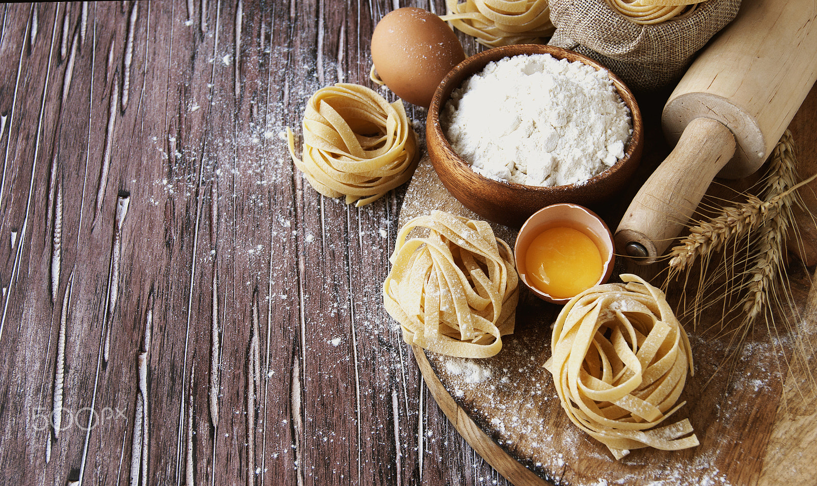 Sony Alpha DSLR-A380 + Sony DT 18-55mm F3.5-5.6 SAM sample photo. Uncooked pasta with flour on the table, selective focus photography