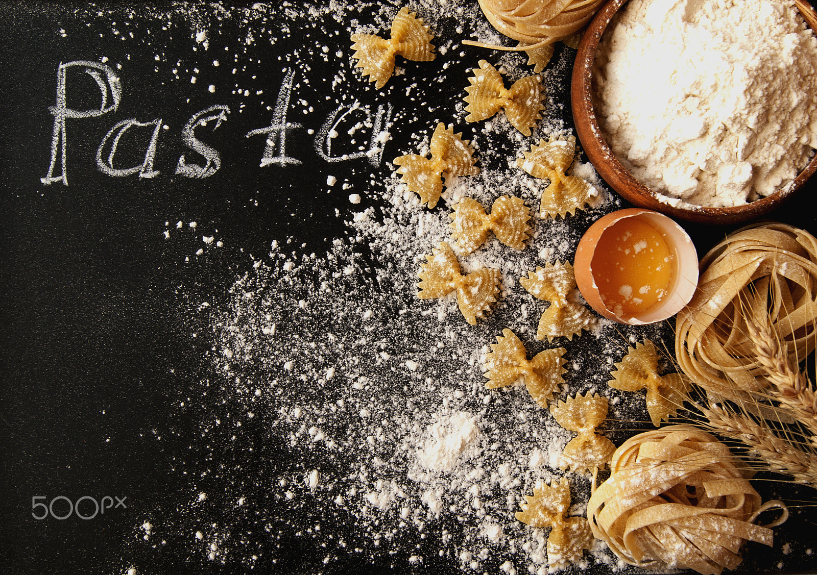 Sony Alpha DSLR-A380 + Sony DT 18-55mm F3.5-5.6 SAM sample photo. Uncooked pasta with flour on the table, selective focus photography