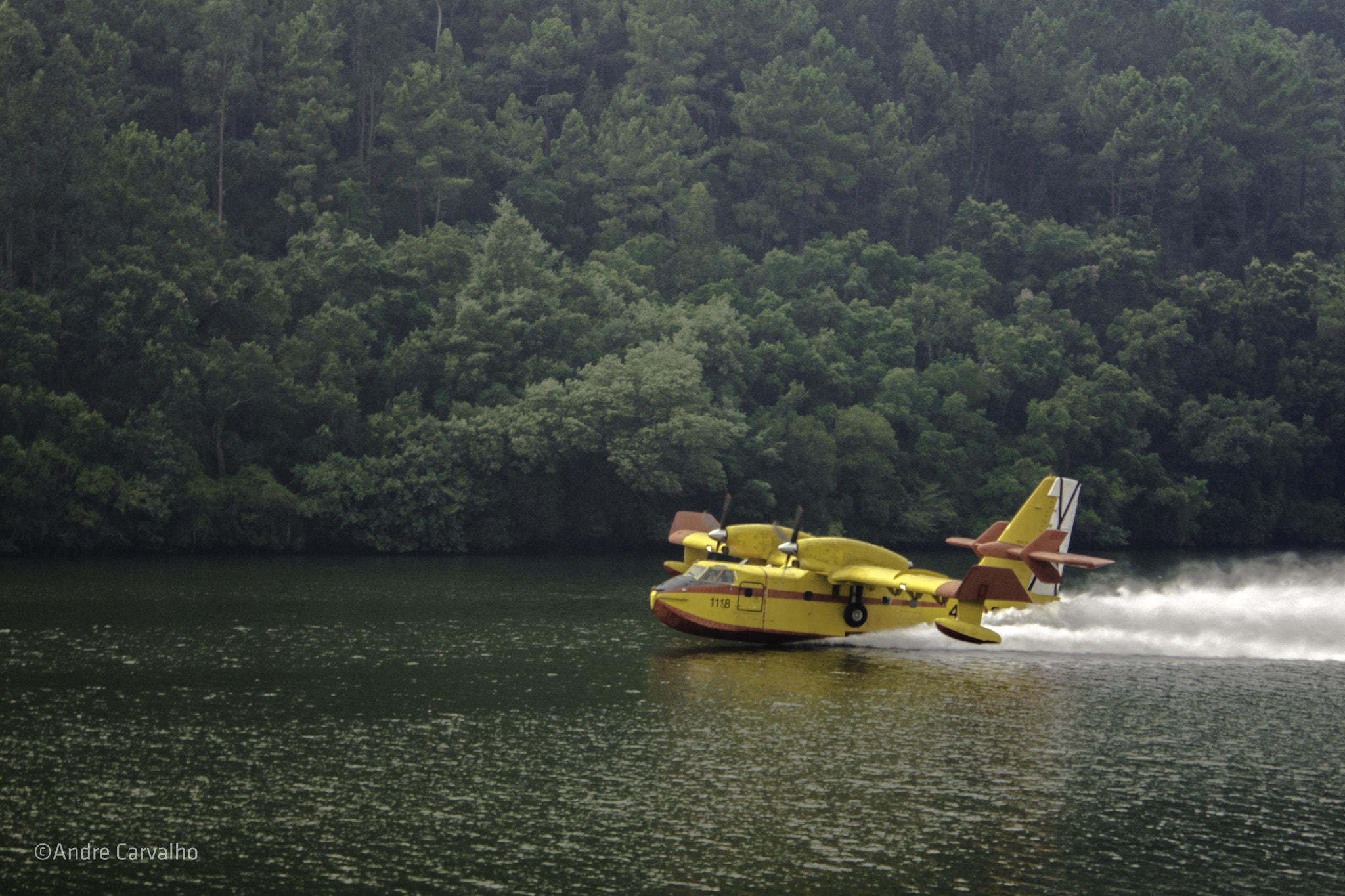 24-240mm F3.5-6.3 OSS sample photo. Canadair filling up. photography
