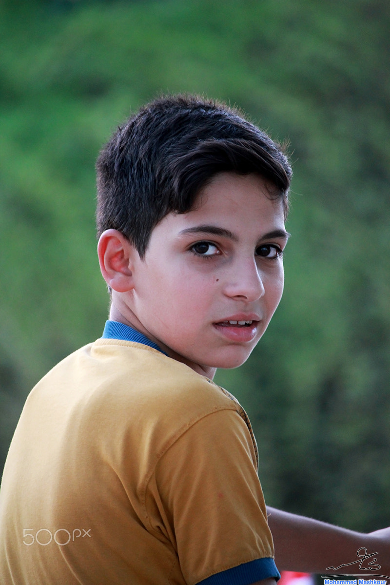 Canon EF-S 55-250mm F4-5.6 IS STM sample photo. A young iraqi boy photography