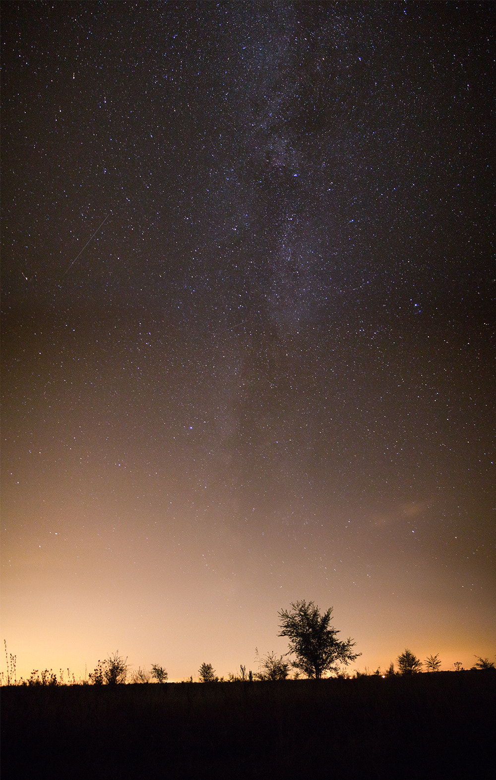 Sigma 17-70mm F2.8-4 DC Macro OS HSM sample photo. The starry sky above the town photography