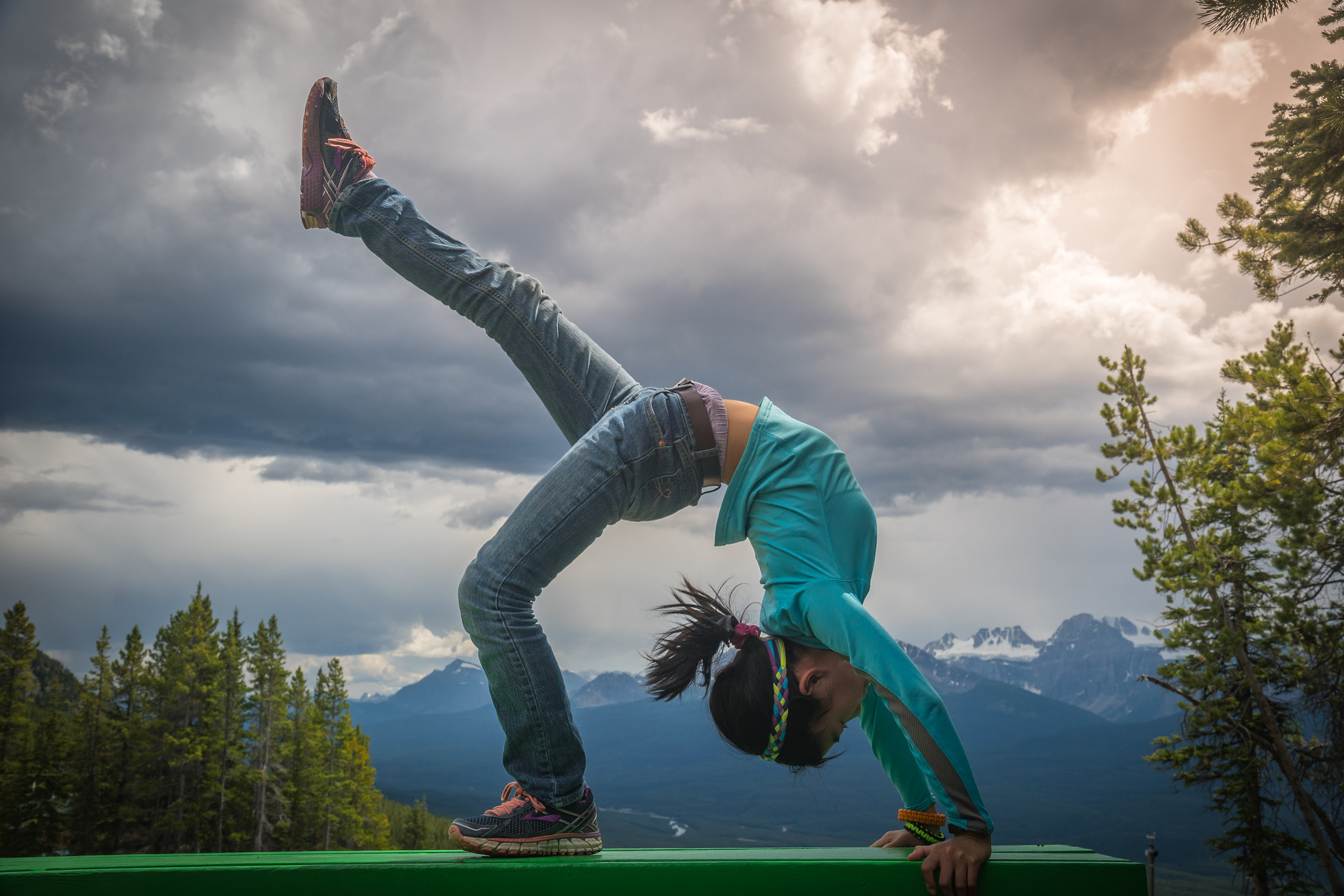 Sony a7R II + Canon EF-S 17-55mm F2.8 IS USM sample photo. Young asian girl in bridge pose at lake louise area photography