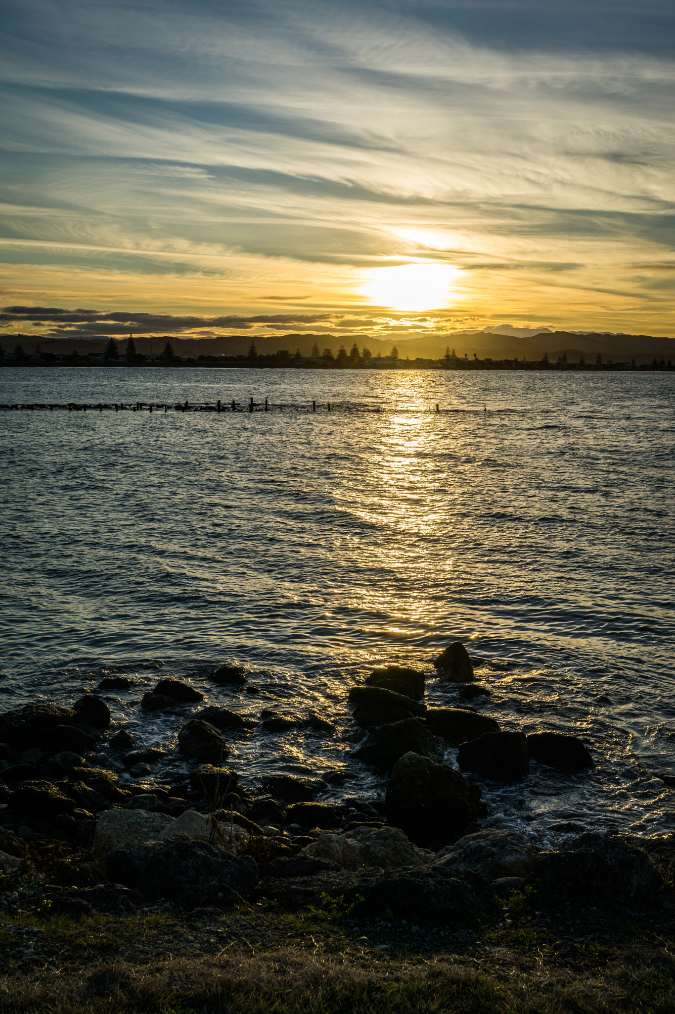Sony FE 28mm F2 sample photo. Sunset by the beach photography