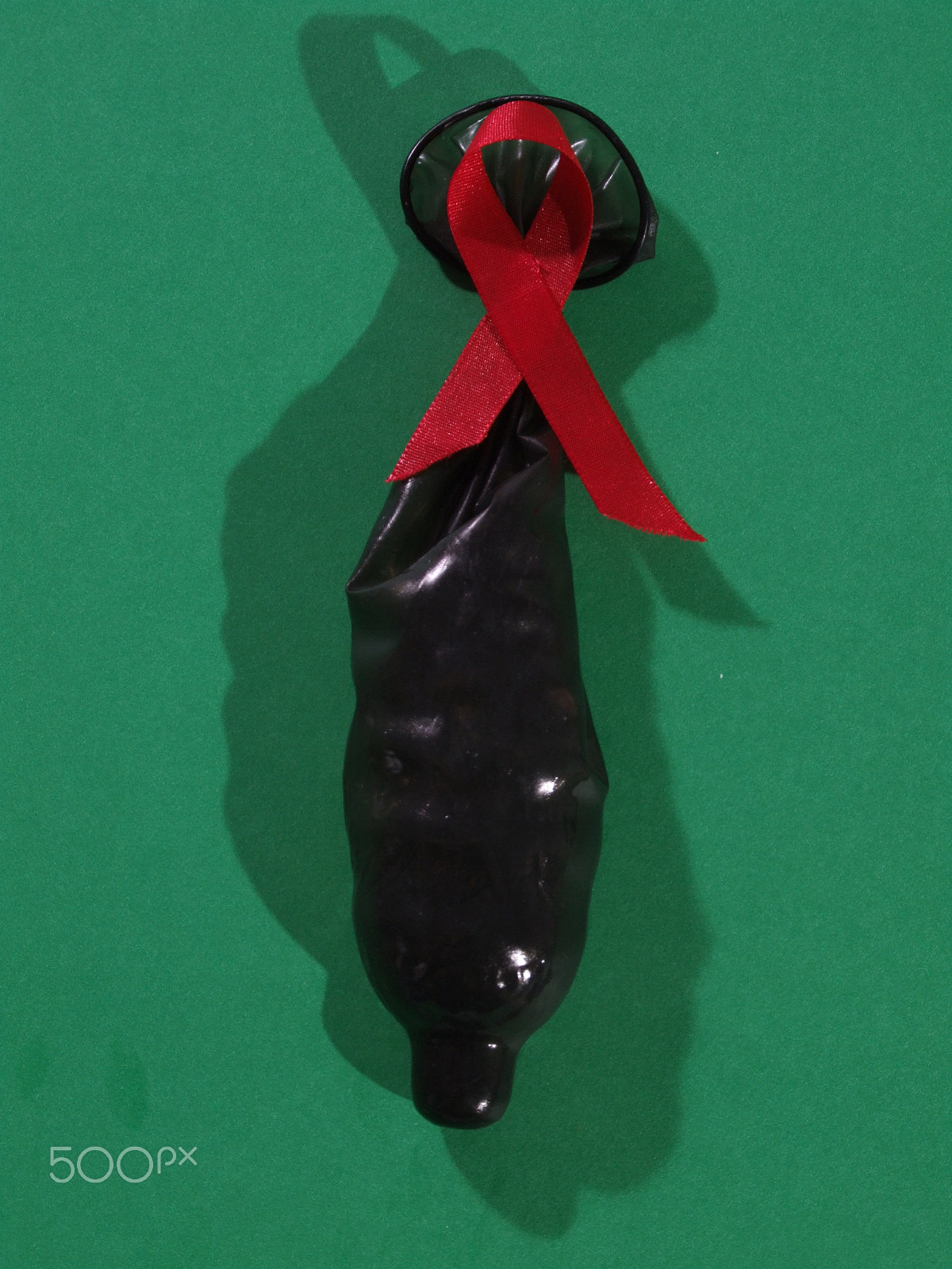 Fujifilm FinePix S9000 sample photo. Black condom aids photography