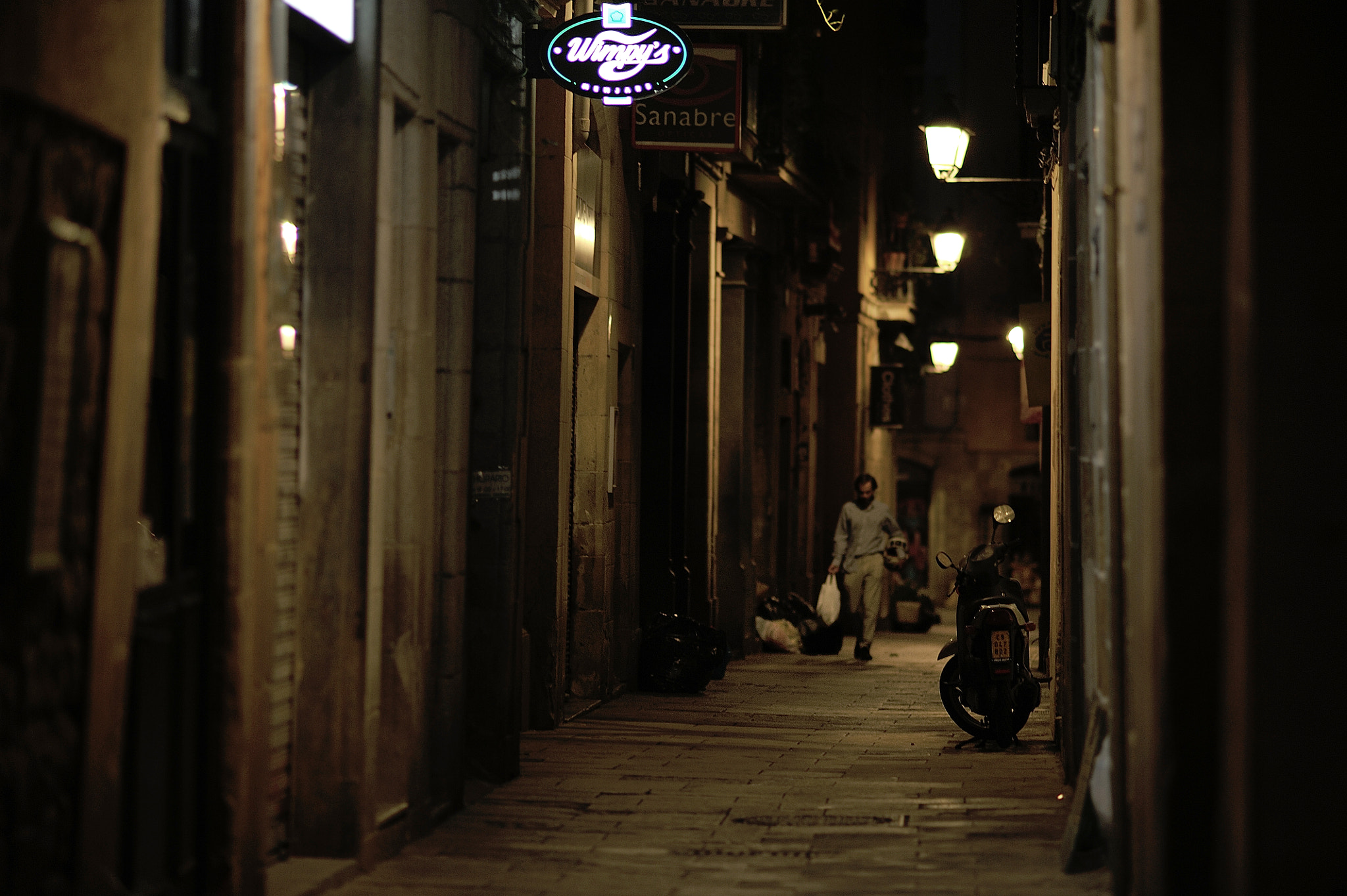 Nikon D700 + AF DC-Nikkor 135mm f/2D sample photo. A man and a bike photography