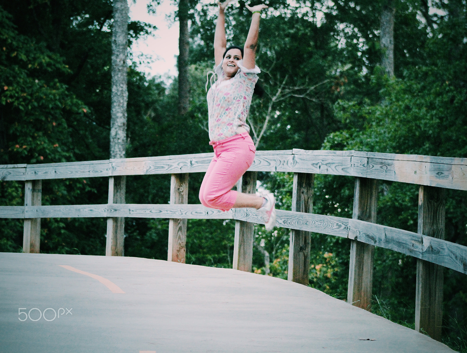 Canon EF75-300mm f/4-5.6 sample photo. Happy self delighted young woman doing joy jump photography