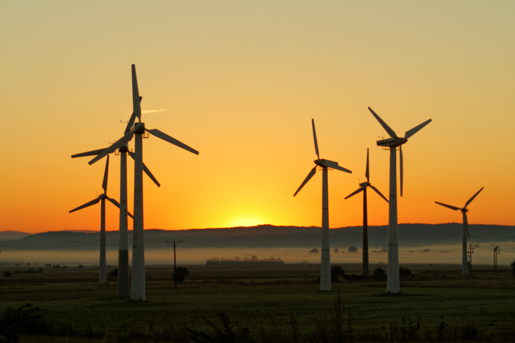 Sony SLT-A58 + Tamron AF 70-300mm F4-5.6 Di LD Macro sample photo. Windmills at dawn photography