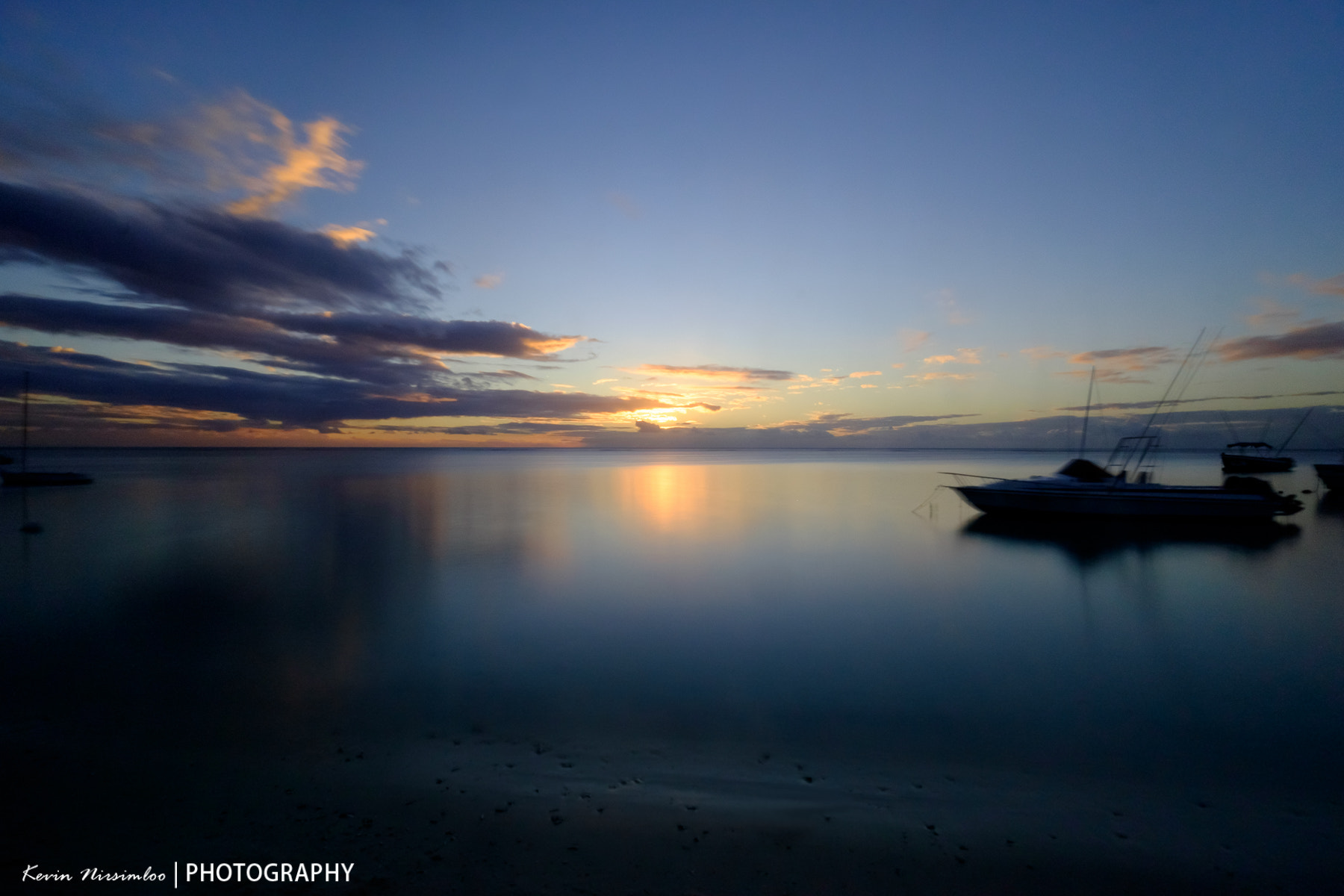 ZEISS Touit 12mm F2.8 sample photo. Sunset at trou-aux-biches 02 photography