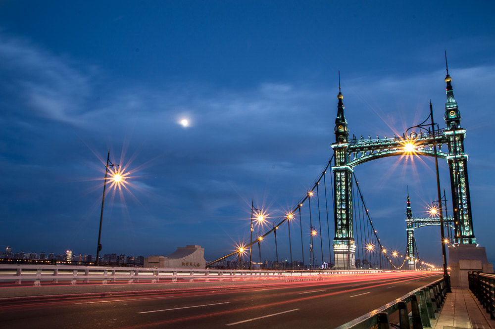 Nikon D3200 + Nikon PC-E Nikkor 24mm F3.5D ED Tilt-Shift sample photo. The pic was taken in harbin(china)on the bridge that connects the north and south part of the city. photography