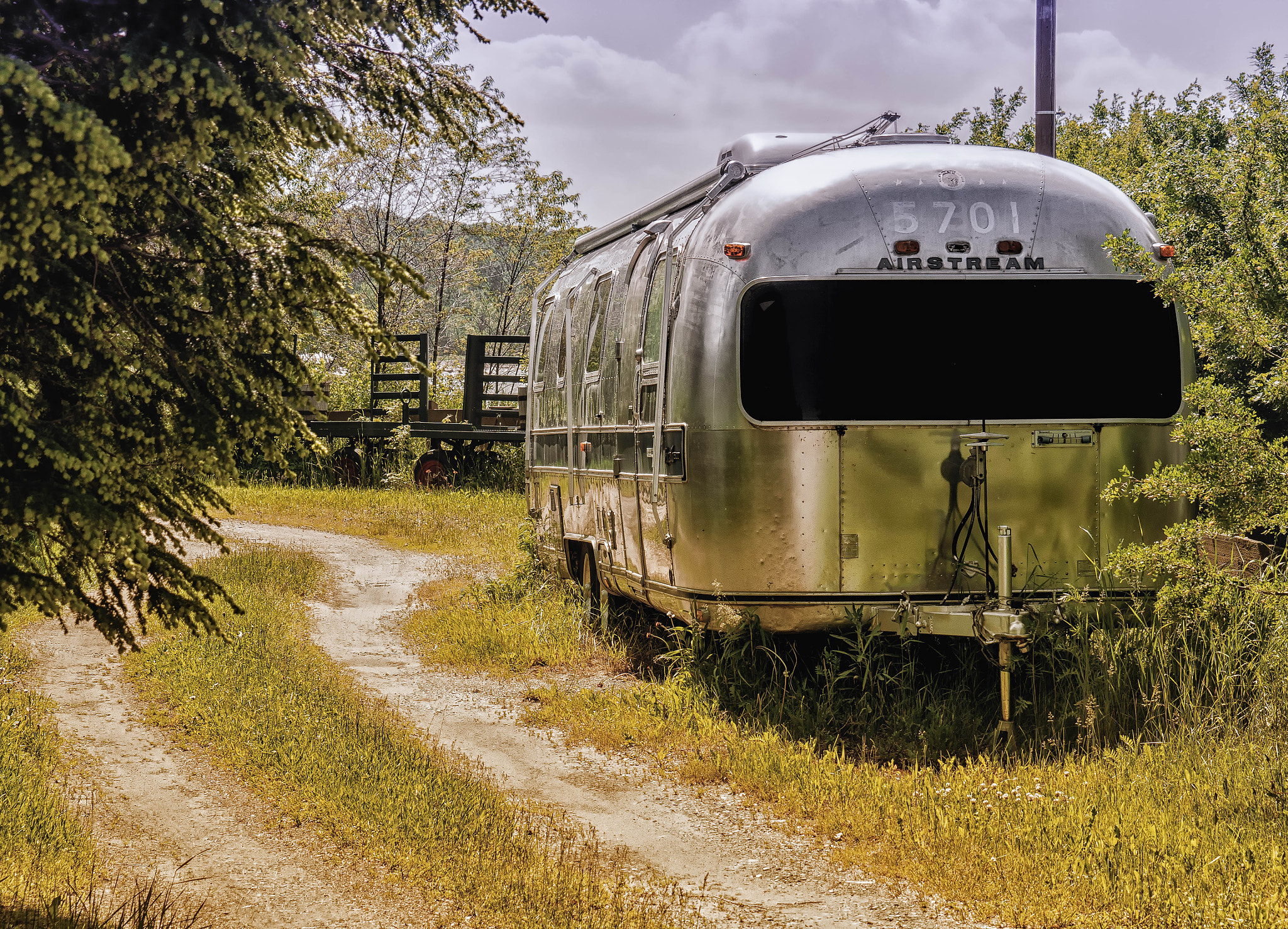 OLYMPUS M.14-150mm F4.0-5.6 II sample photo. Airstream photography