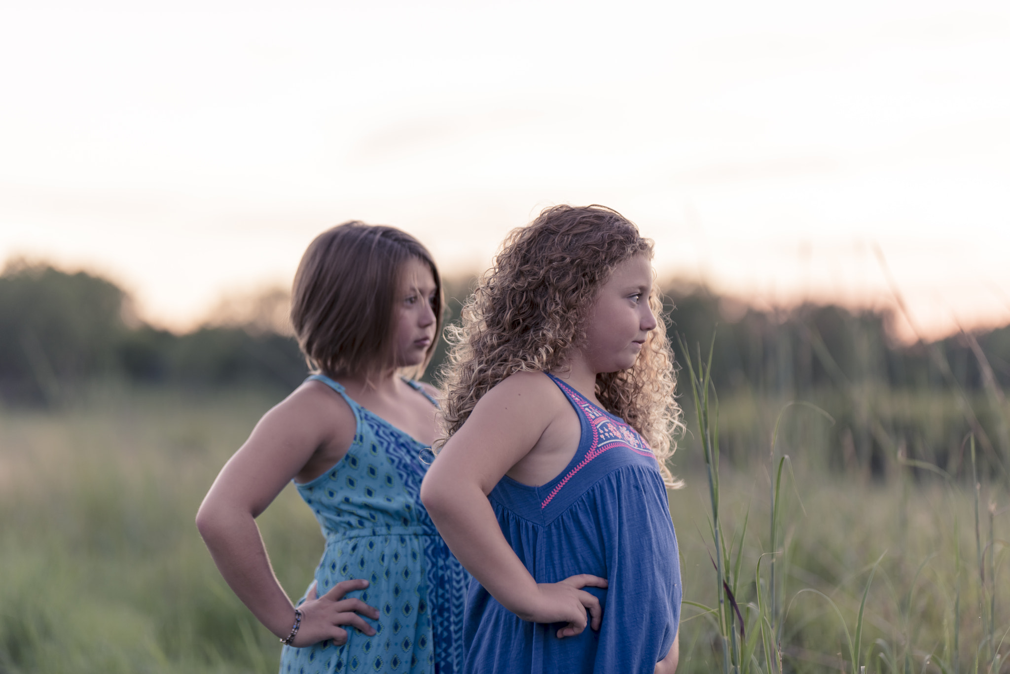 Nikon D810 + Sigma 105mm F2.8 EX DG Macro sample photo. Children in the grass photography