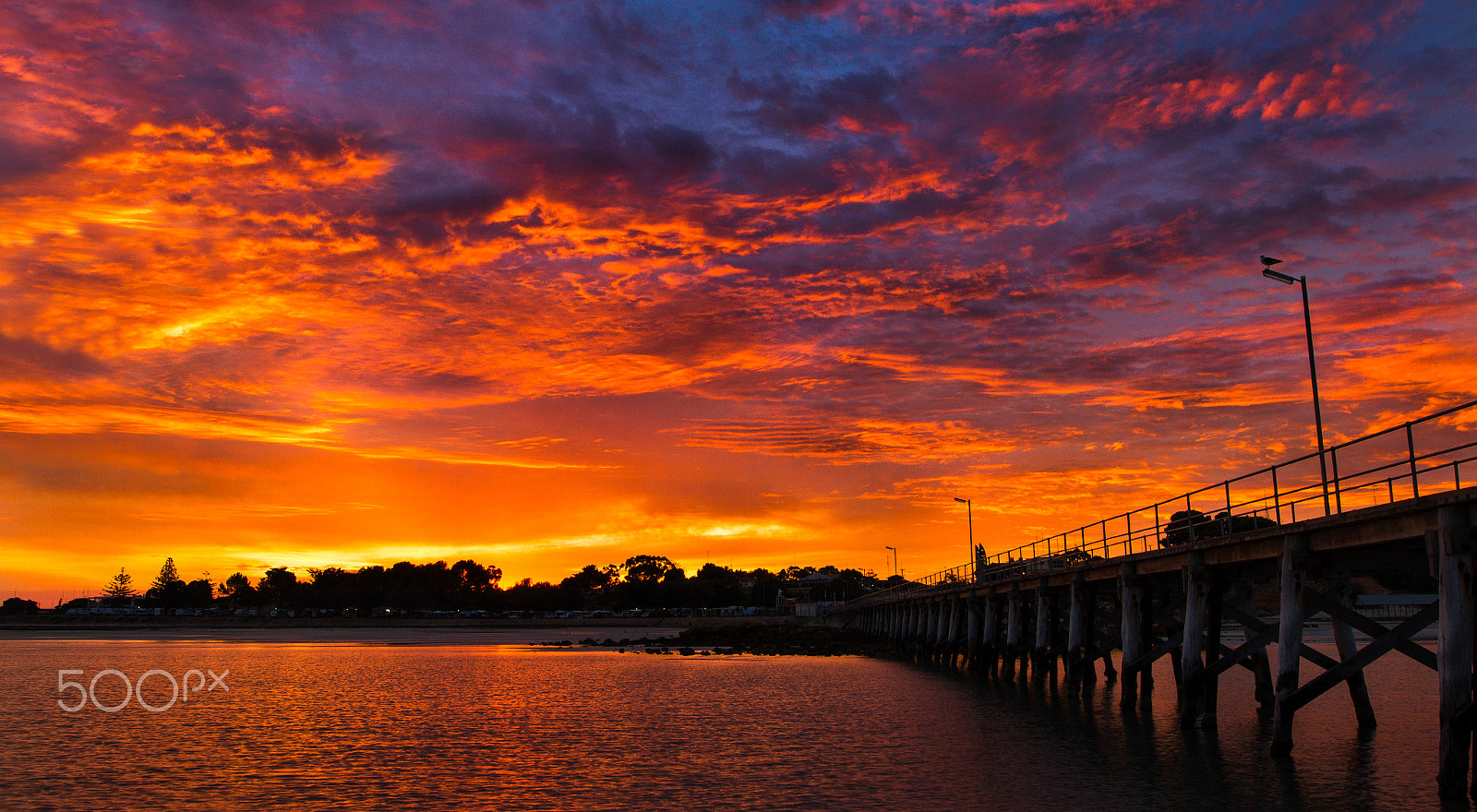 Canon EOS 7D + Canon EF 16-35mm F4L IS USM sample photo. Sunrise on fire at moonta jetty photography