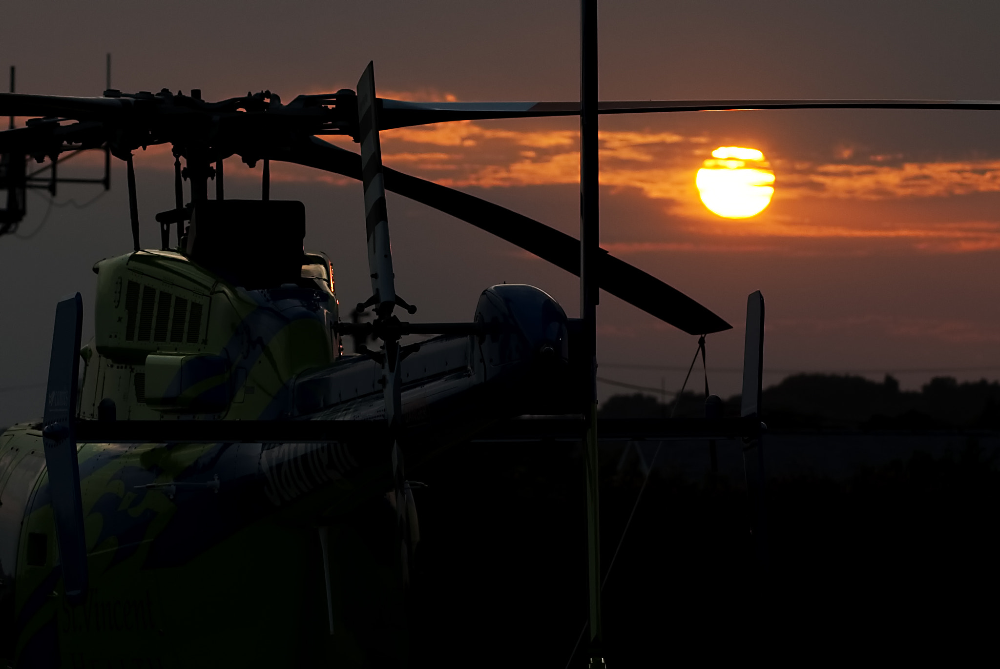 Nikon D3000 sample photo. Helicopter sunset photography