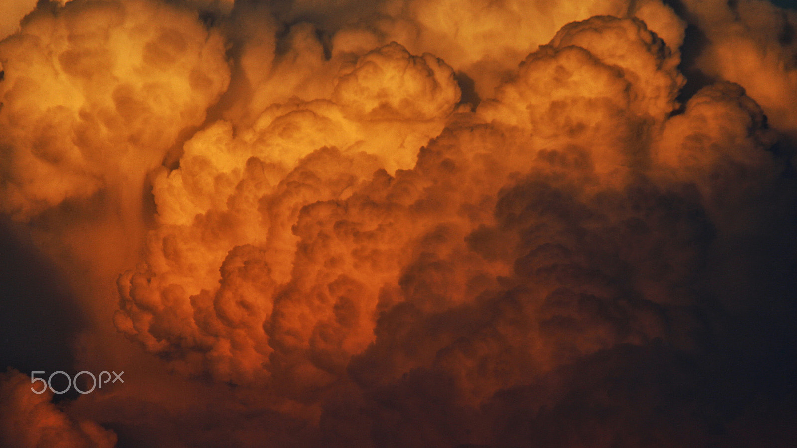 Canon EF-S 55-250mm F4-5.6 IS sample photo. Fires keep burning. clouds at sunset. photography