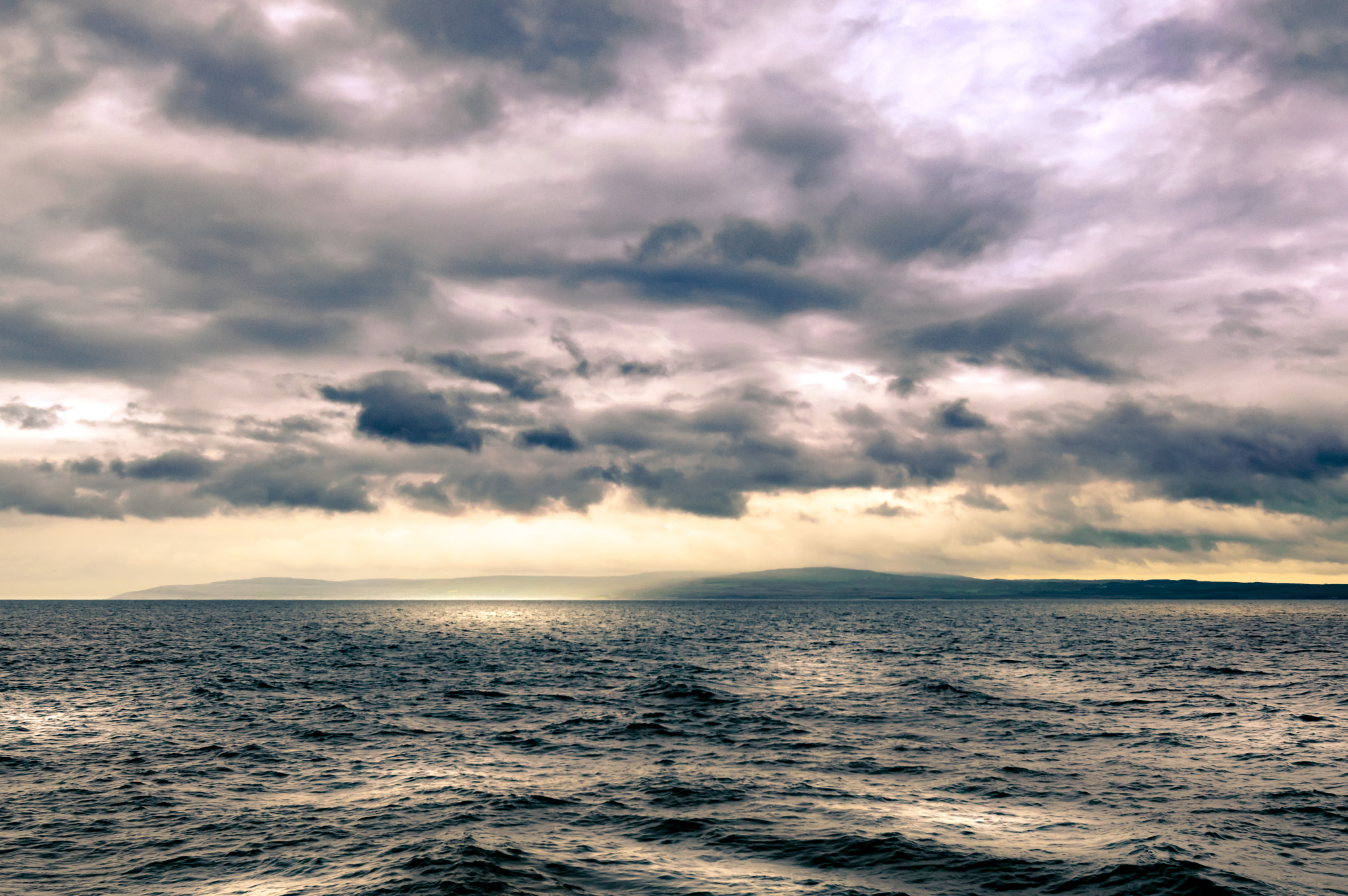 Nikon D3200 + Tokina AT-X 11-20 F2.8 PRO DX (AF 11-20mm f/2.8) sample photo. Dramatic sky above the ocean photography