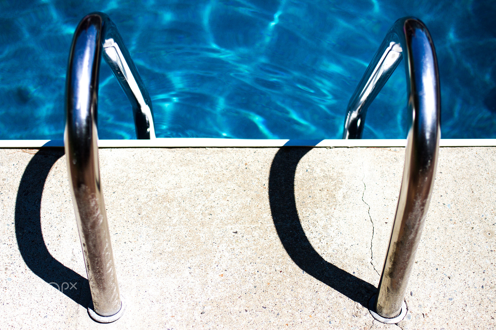 Canon EOS 7D + Canon EF 35mm F2 sample photo. Into the pool photography