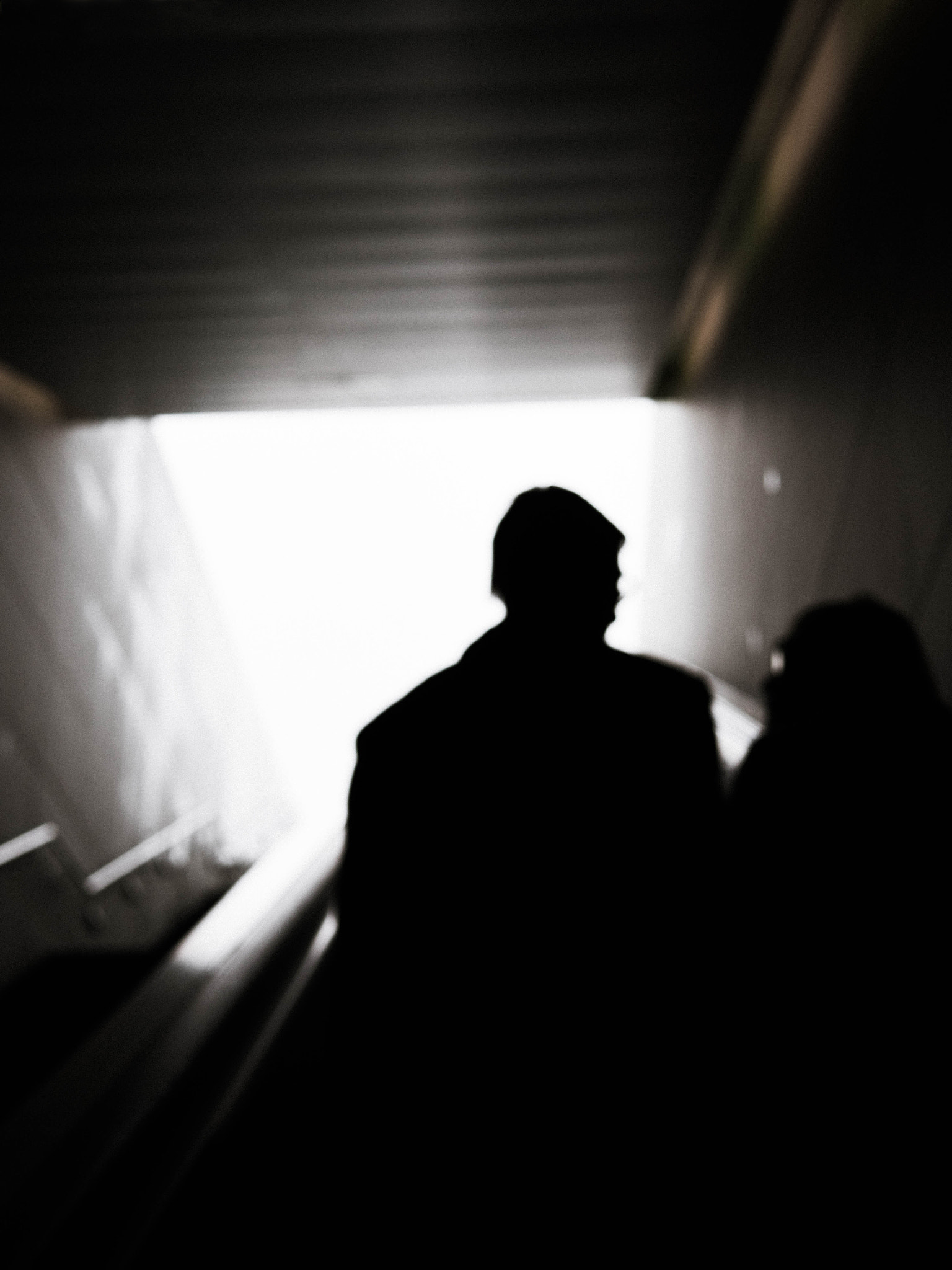 Panasonic Lumix DMC-GH4 + Panasonic Leica DG Summilux 25mm F1.4 II ASPH sample photo. Shadow couple on stairs photography
