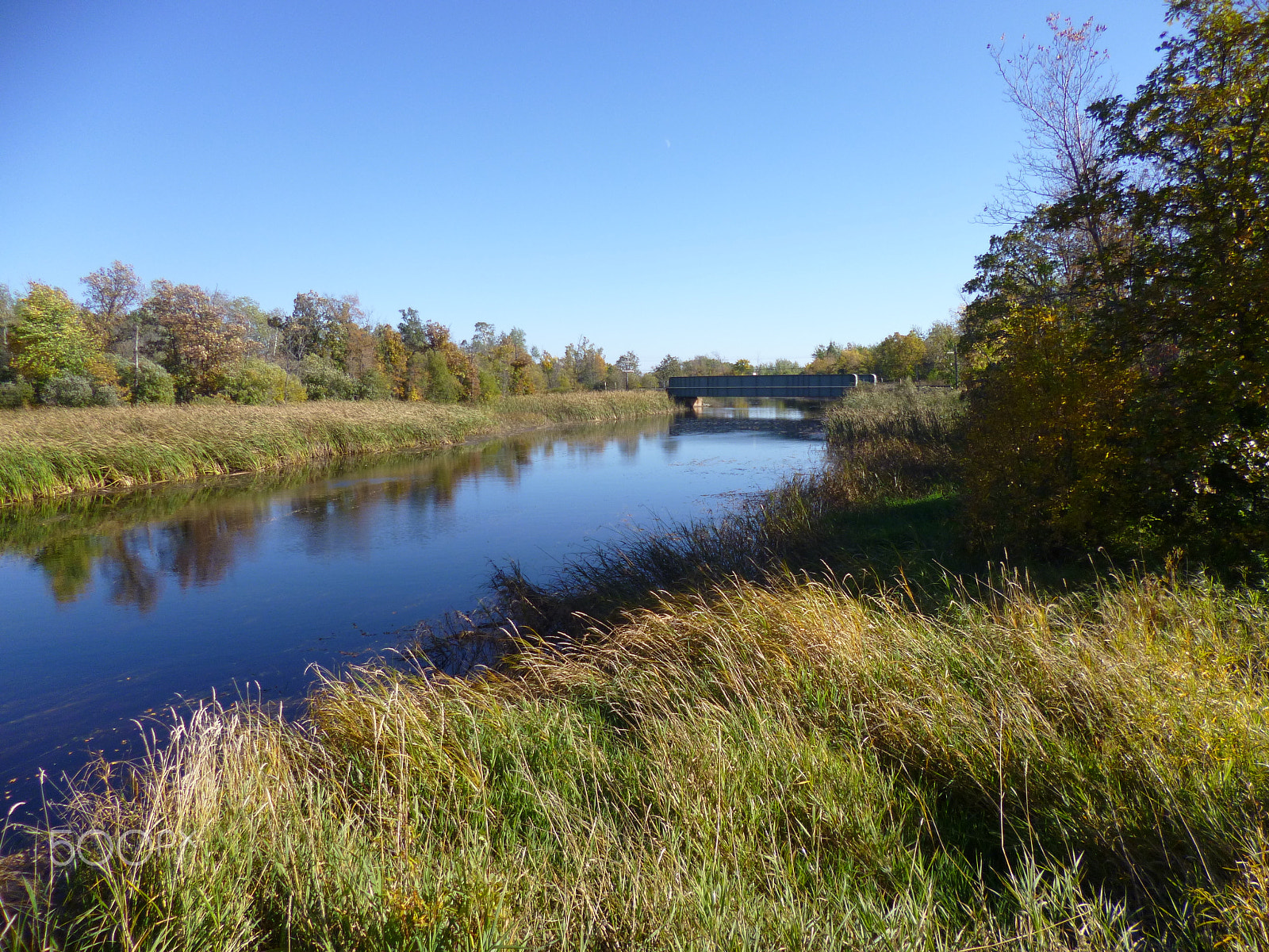 Panasonic DMC-FH8 sample photo. Typical stream running through prairie  countryside photography