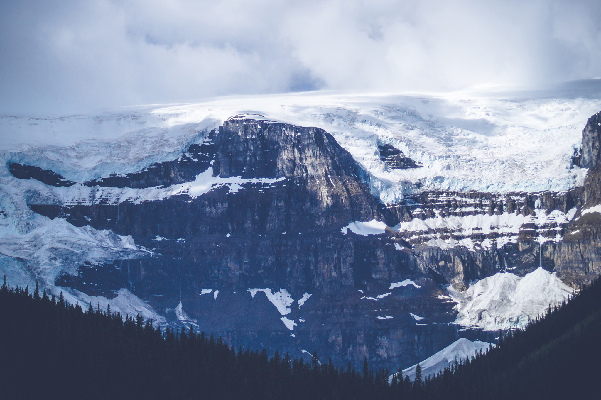 Sony 75-300mm F4.5-5.6 sample photo. Snow on mountains with clouds photography