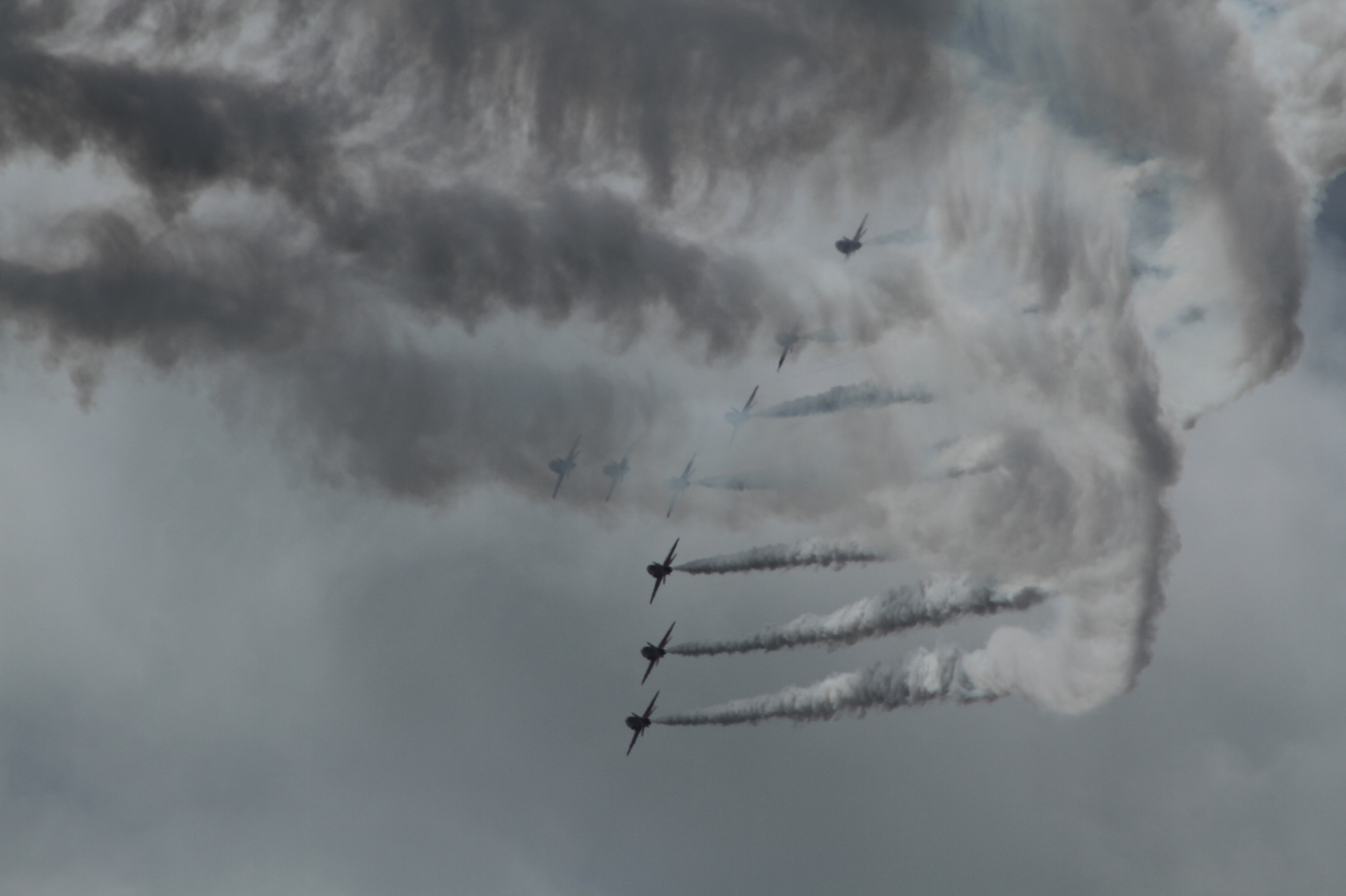 Canon EOS 7D + Tamron AF 70-300mm F4-5.6 Di LD Macro sample photo. Red  arrows in smoke photography