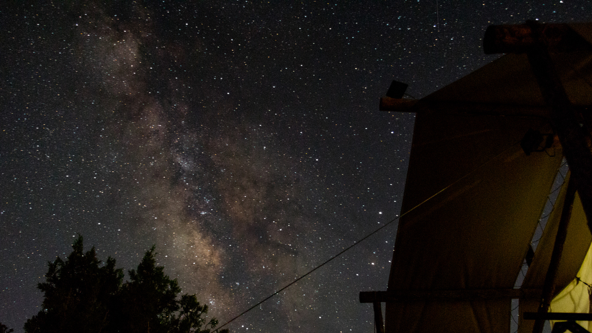 Canon EOS 750D (EOS Rebel T6i / EOS Kiss X8i) + Canon EF 17-40mm F4L USM sample photo. Starry nights in a tent photography