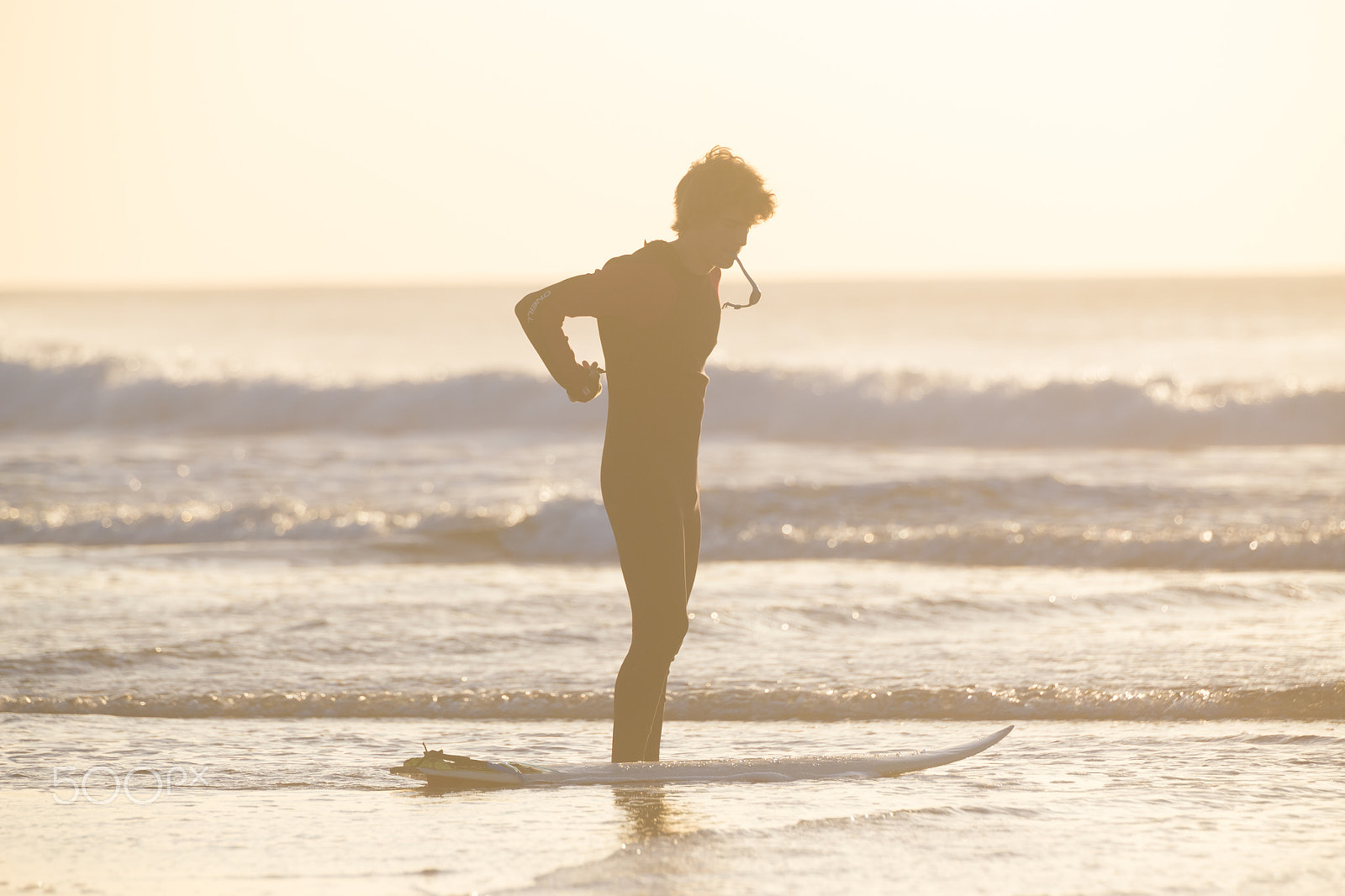 Canon EOS 6D + Canon EF 70-200mm F2.8L IS II USM sample photo. Silhouette of surfer on beach with surfboard. photography