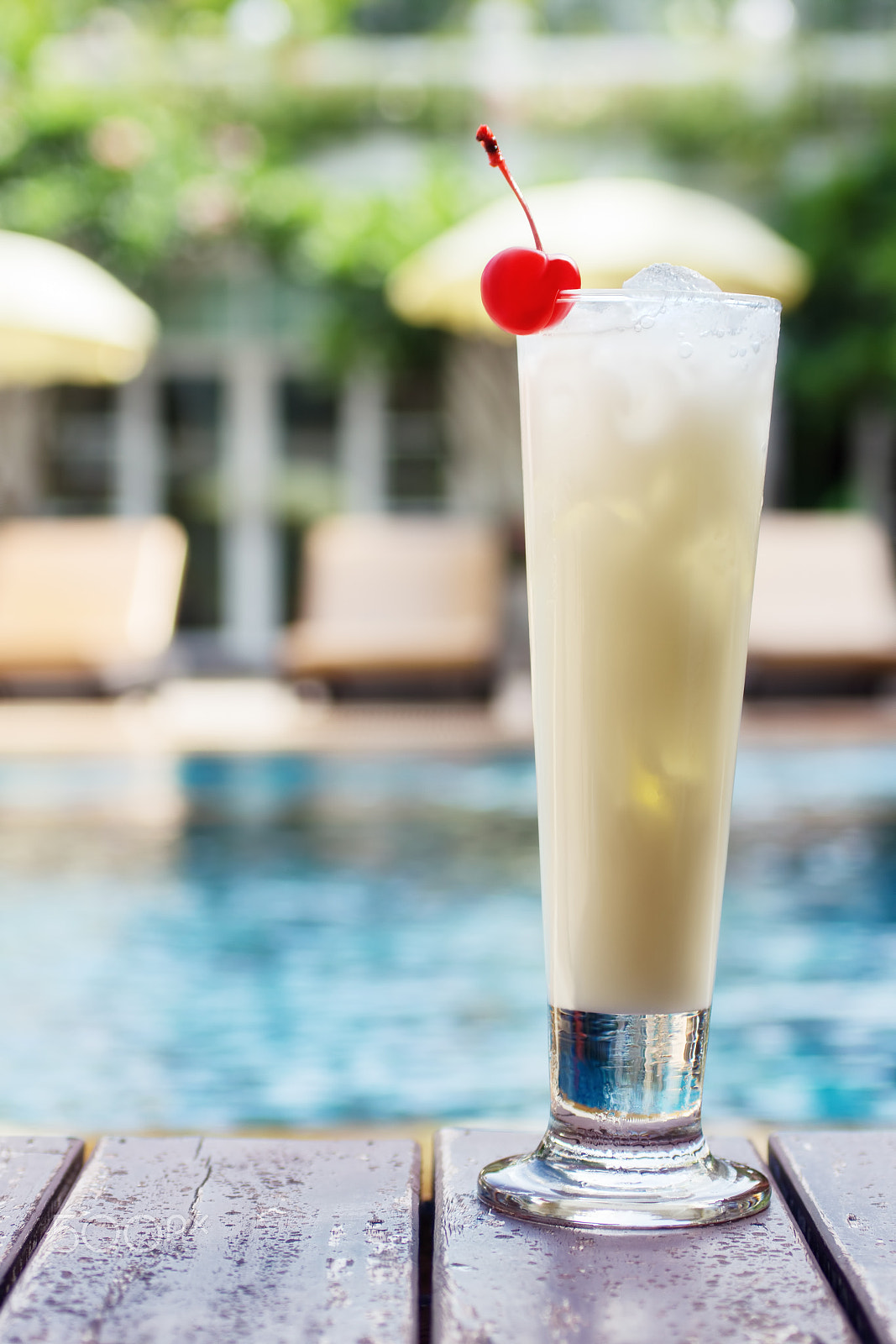 Sony SLT-A77 + MACRO 50mm F2.8 sample photo. Pina colada cocktail beside swimming pool photography