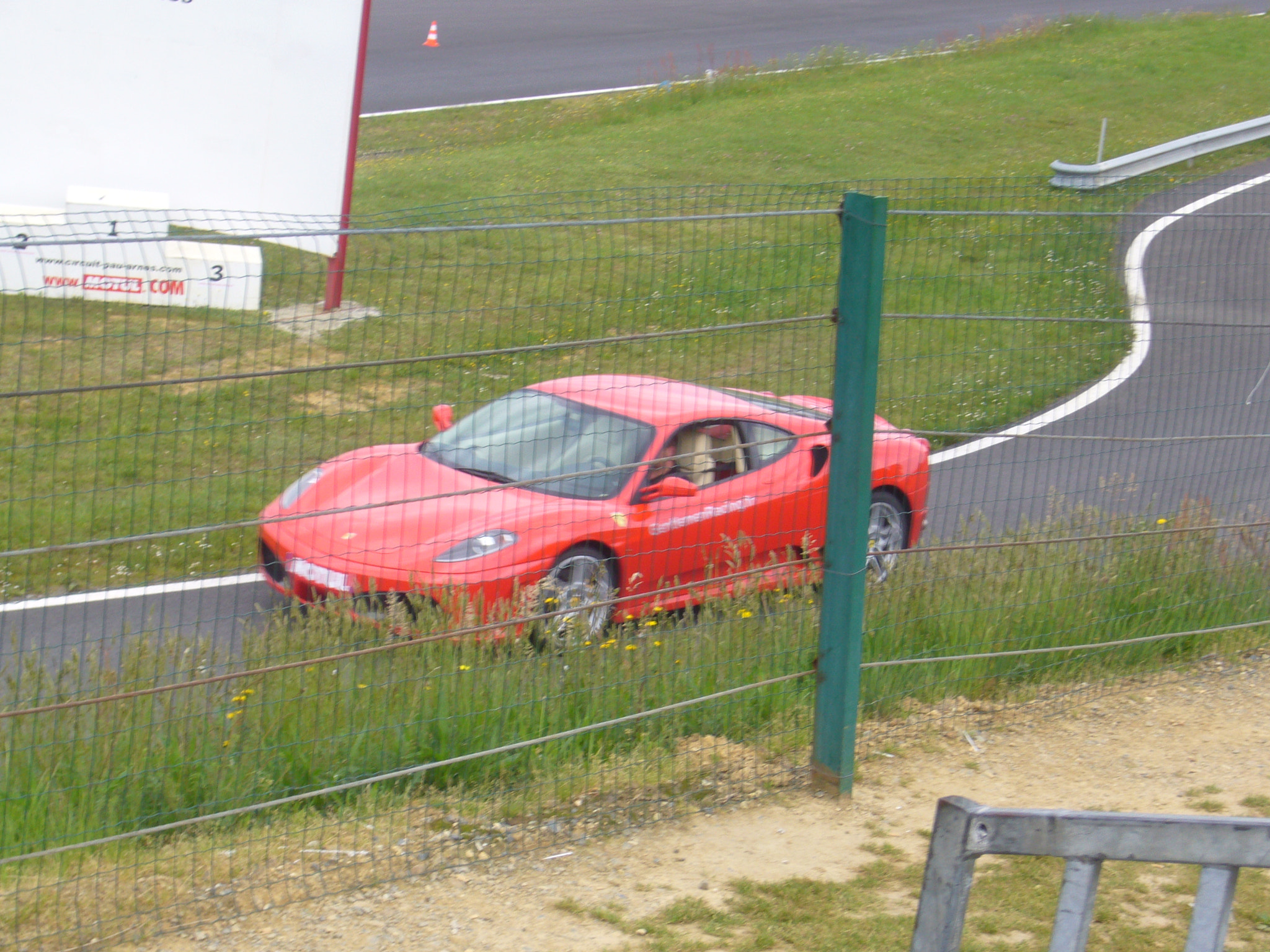 Panasonic DMC-FX9 sample photo. Ferrari shot : in turns photography