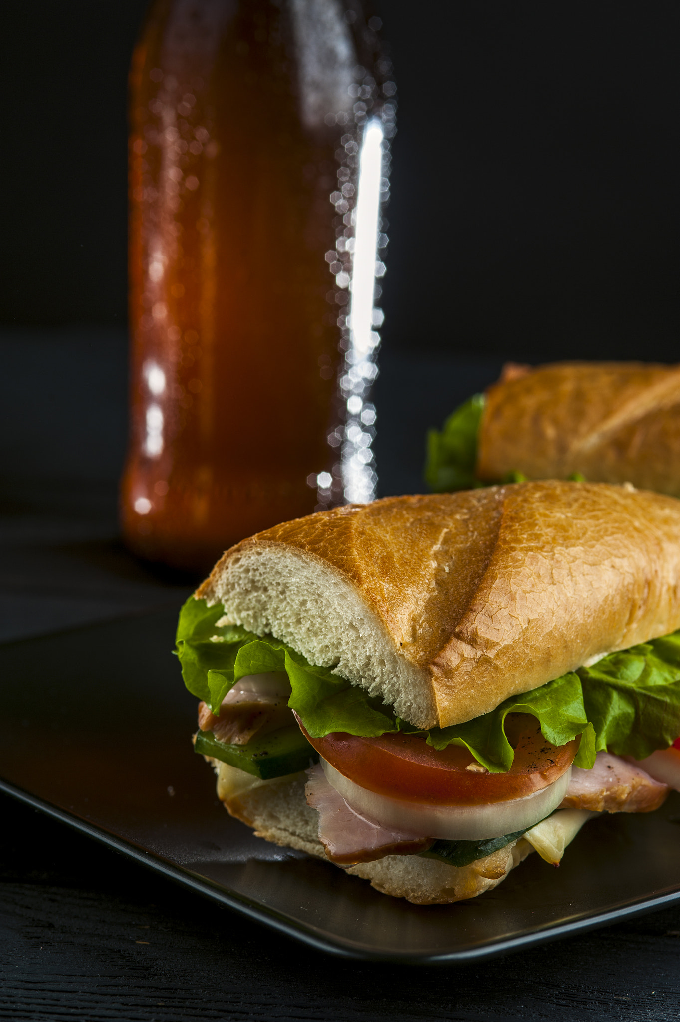 Nikon D700 + AF Micro-Nikkor 105mm f/2.8 sample photo. Sandwich with ham and vegetables and beer bottle on dark background photography