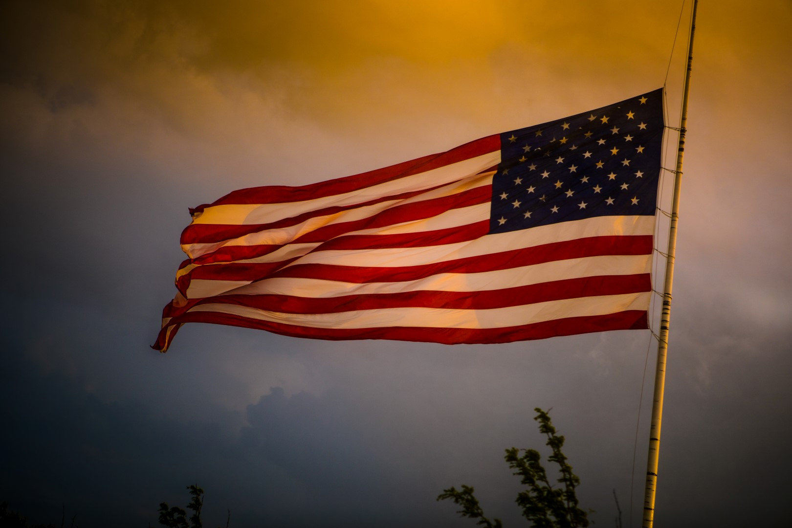 Canon EOS-1D X Mark II + Canon EF 24-70mm F2.8L USM sample photo. Old glory golden hour storm photography