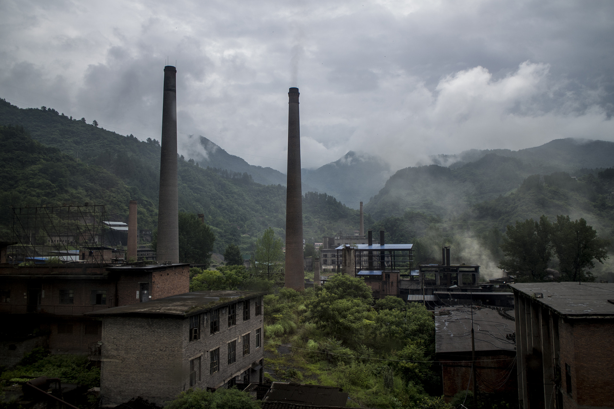 Canon EOS M2 sample photo. A factory among the mountains i photography