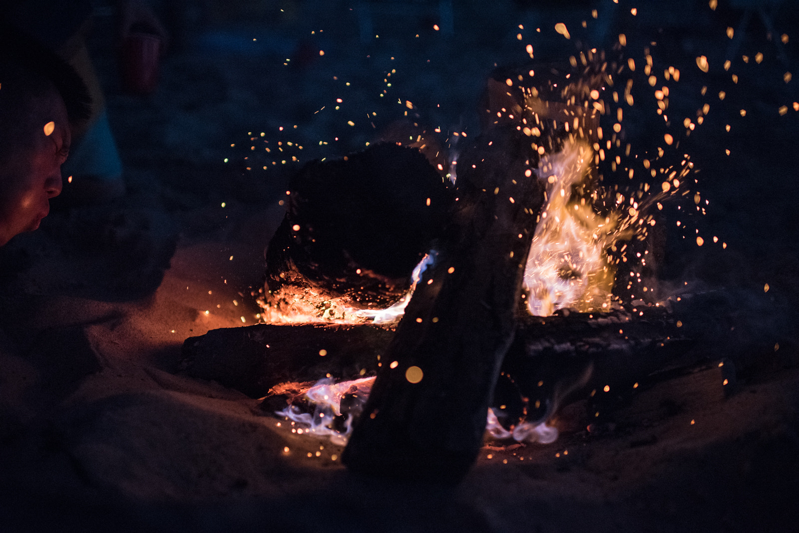 Nikon D750 + Nikon AF-S Nikkor 35mm F1.4G sample photo. Bernie making fire photography