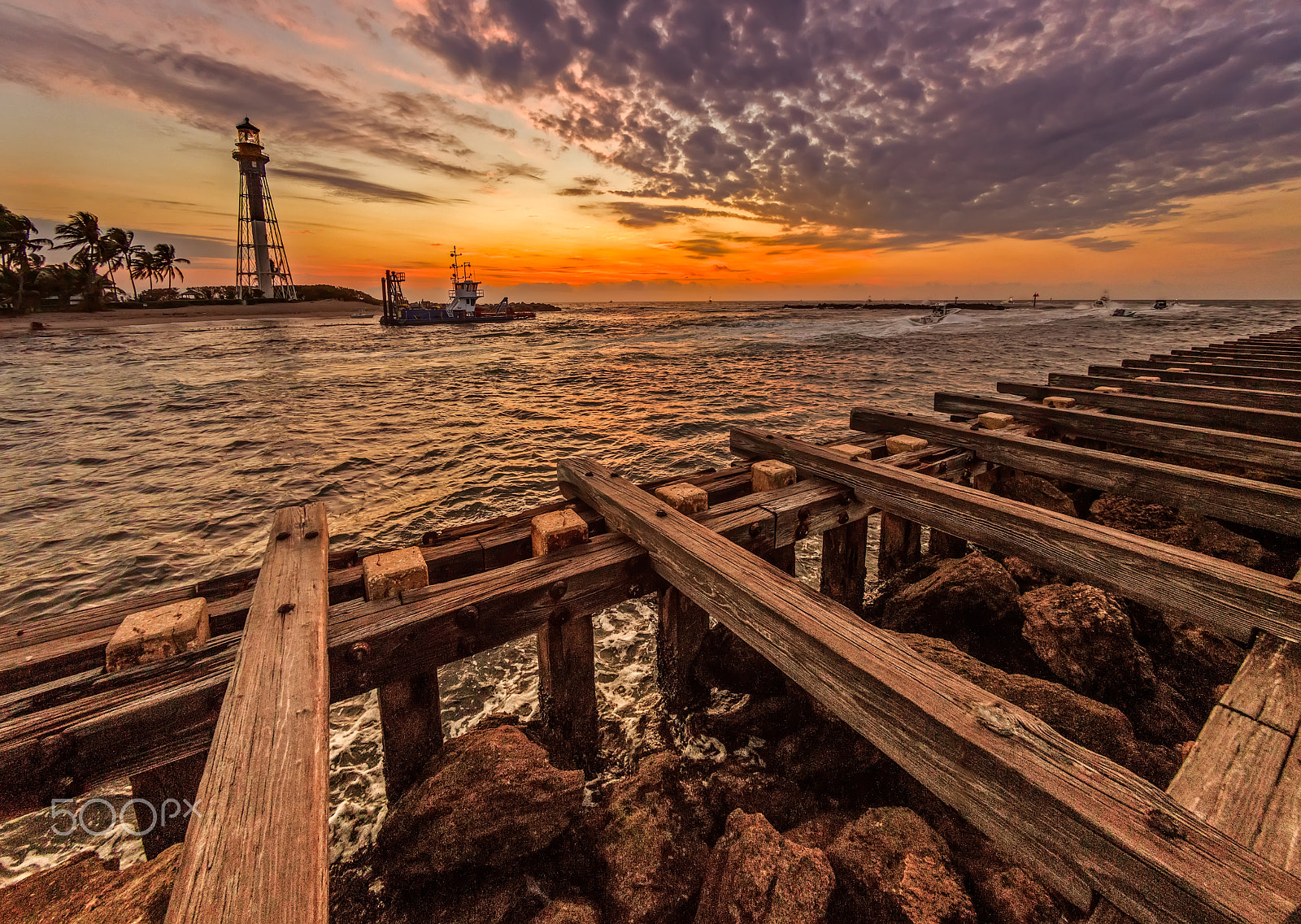 Canon EOS 5DS R + Canon EF 8-15mm F4L Fisheye USM sample photo. Lighthouse sunrise and the jetty photography