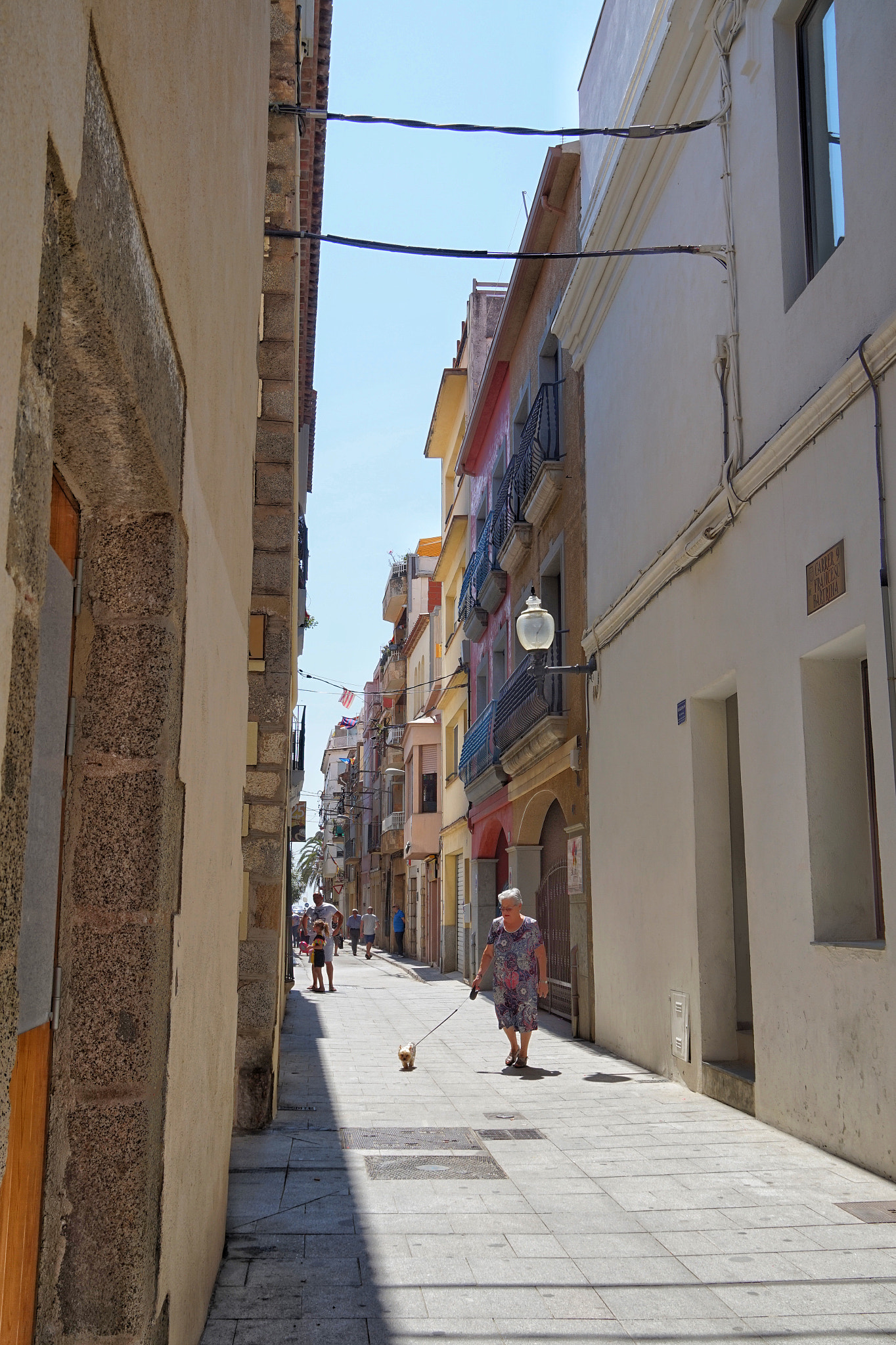 Sony Alpha QX1 sample photo. Calella streets photography