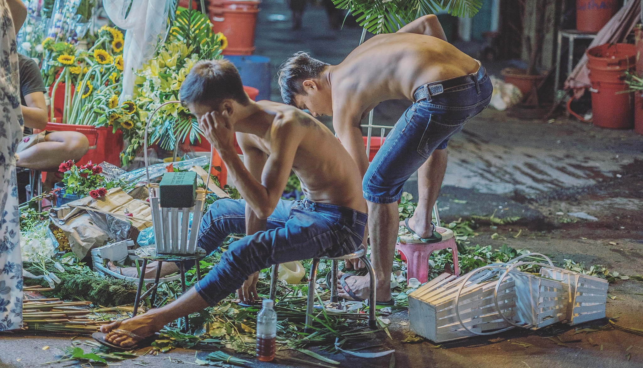 Sony a7S II + Sony FE 50mm F1.8 sample photo. Two young men cutting flowers for the market.  ho chi minh city. photography