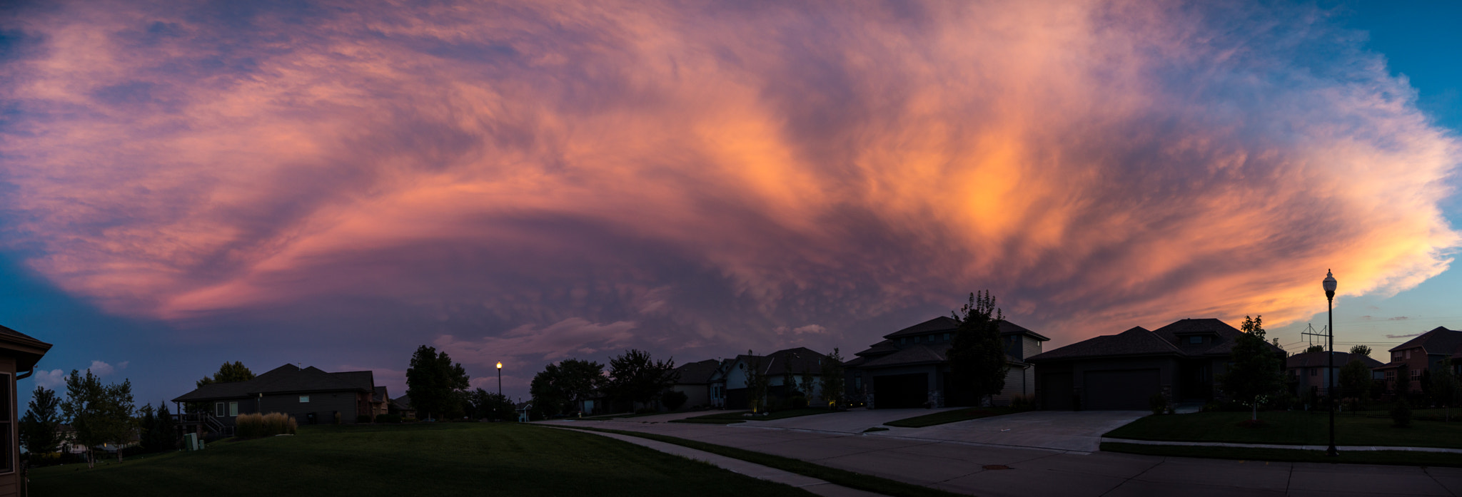 Sony SLT-A77 sample photo. Dramatic clouds at sunset pano photography