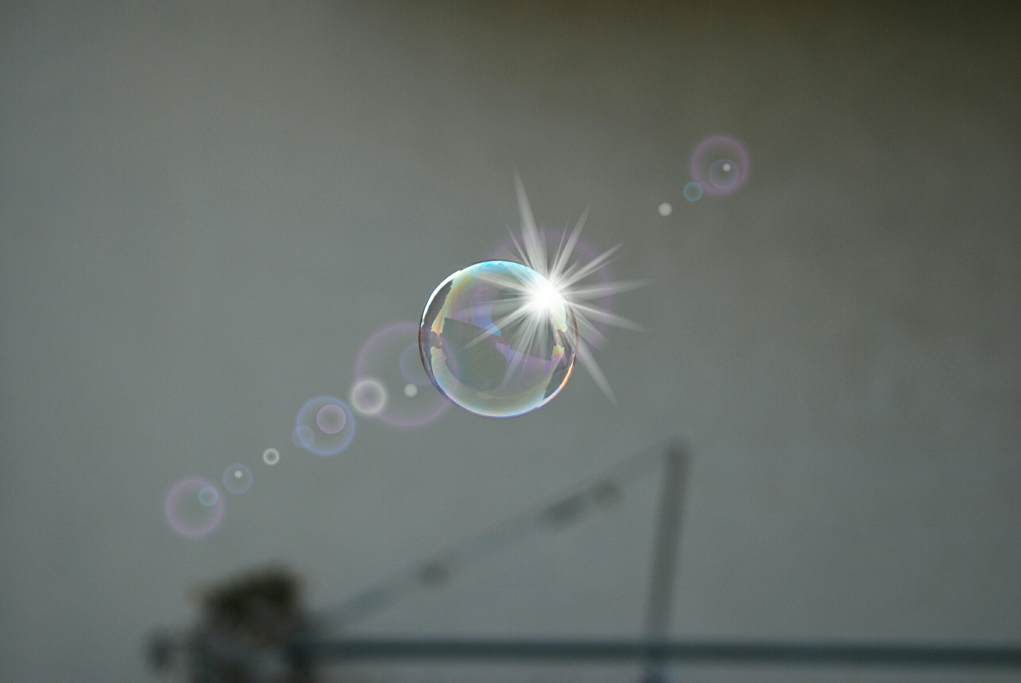 Nikon D60 + Sigma 70-300mm F4-5.6 DG Macro sample photo. Reflected bubble photography