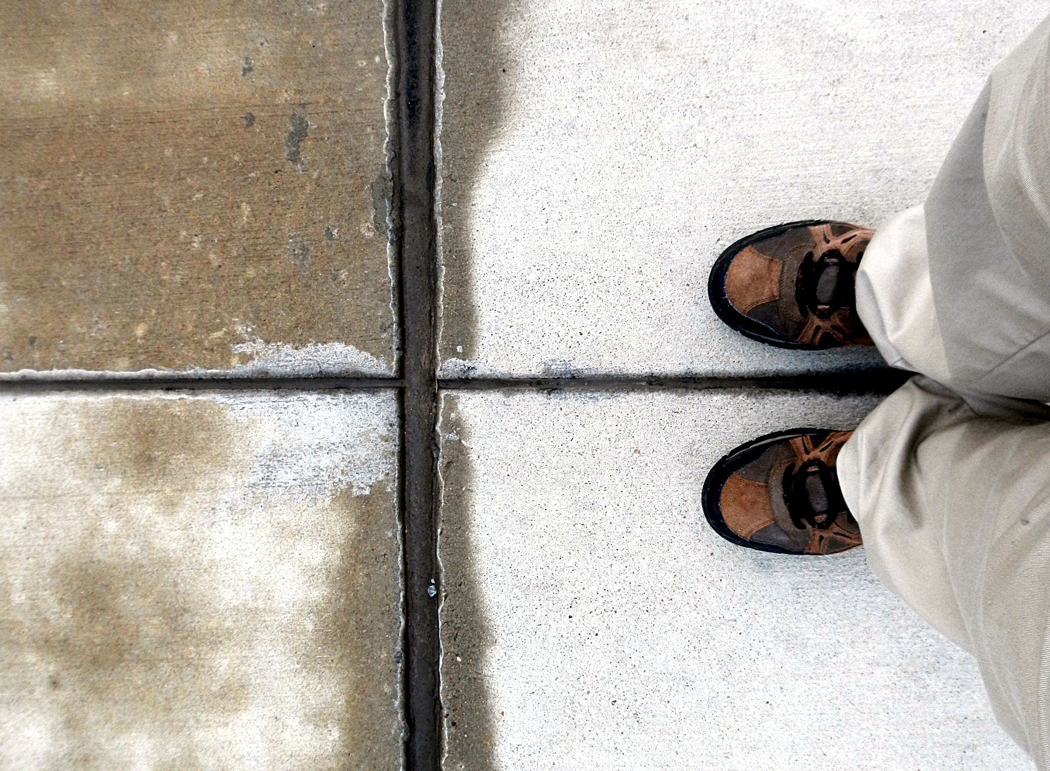 Nikon Coolpix S800c sample photo. Shoes on concrete photography