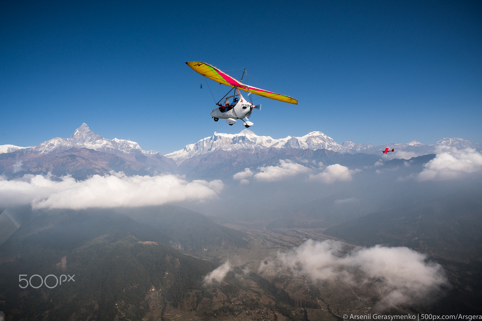 Sony a7R II + Sony 20mm F2.8 sample photo. Ultralight trike and plane fly over pokhara and an photography